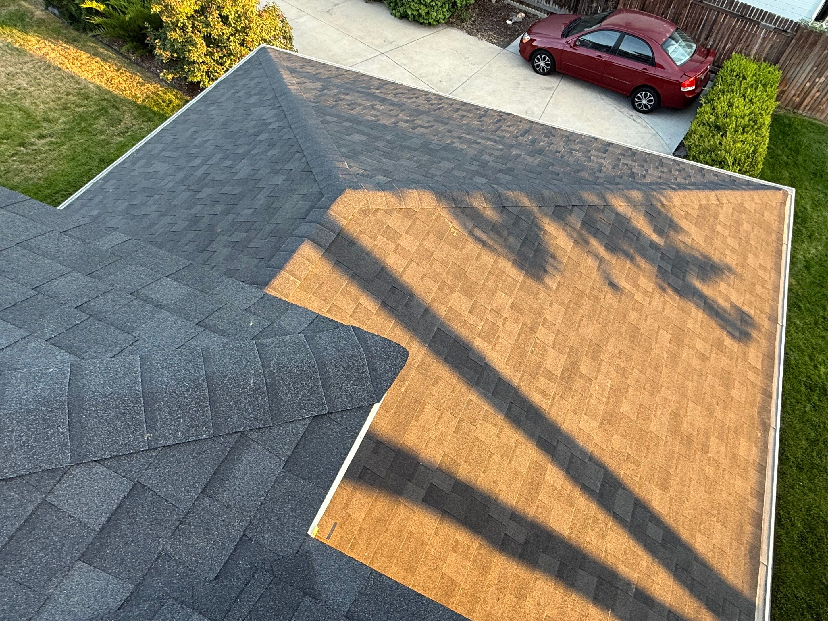 Residential Roof Replacement and Seamless Gutter Installation in Boise by Olive Roofing