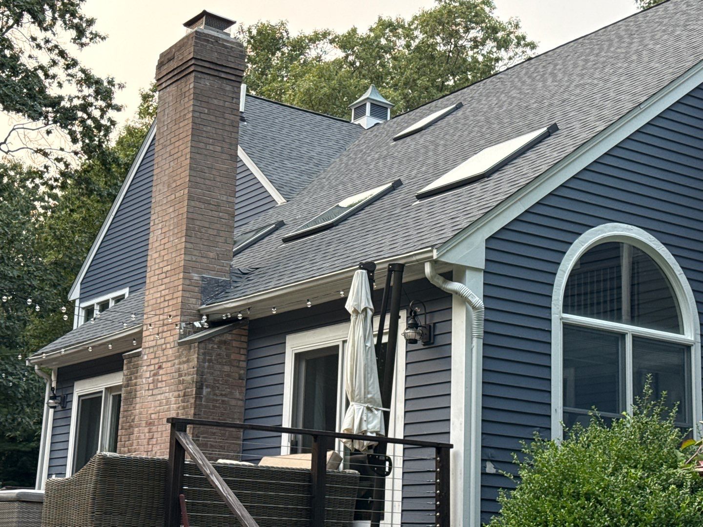 Solar-Ready Roof Replacement with GAF Pewter Gray Shingles & VELUX Skylights by Sensible Home Solutions