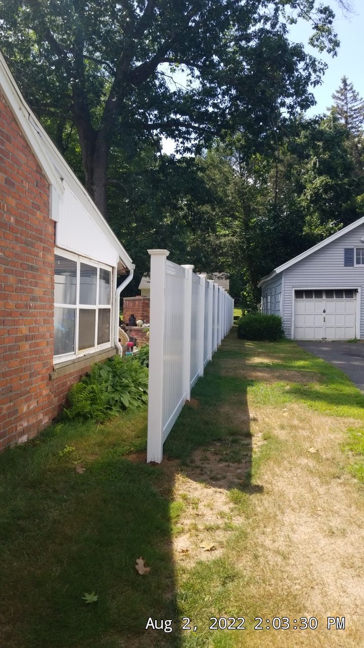 Vinyl Privacy fence White by DiGiorgi Roofing and Siding Inc