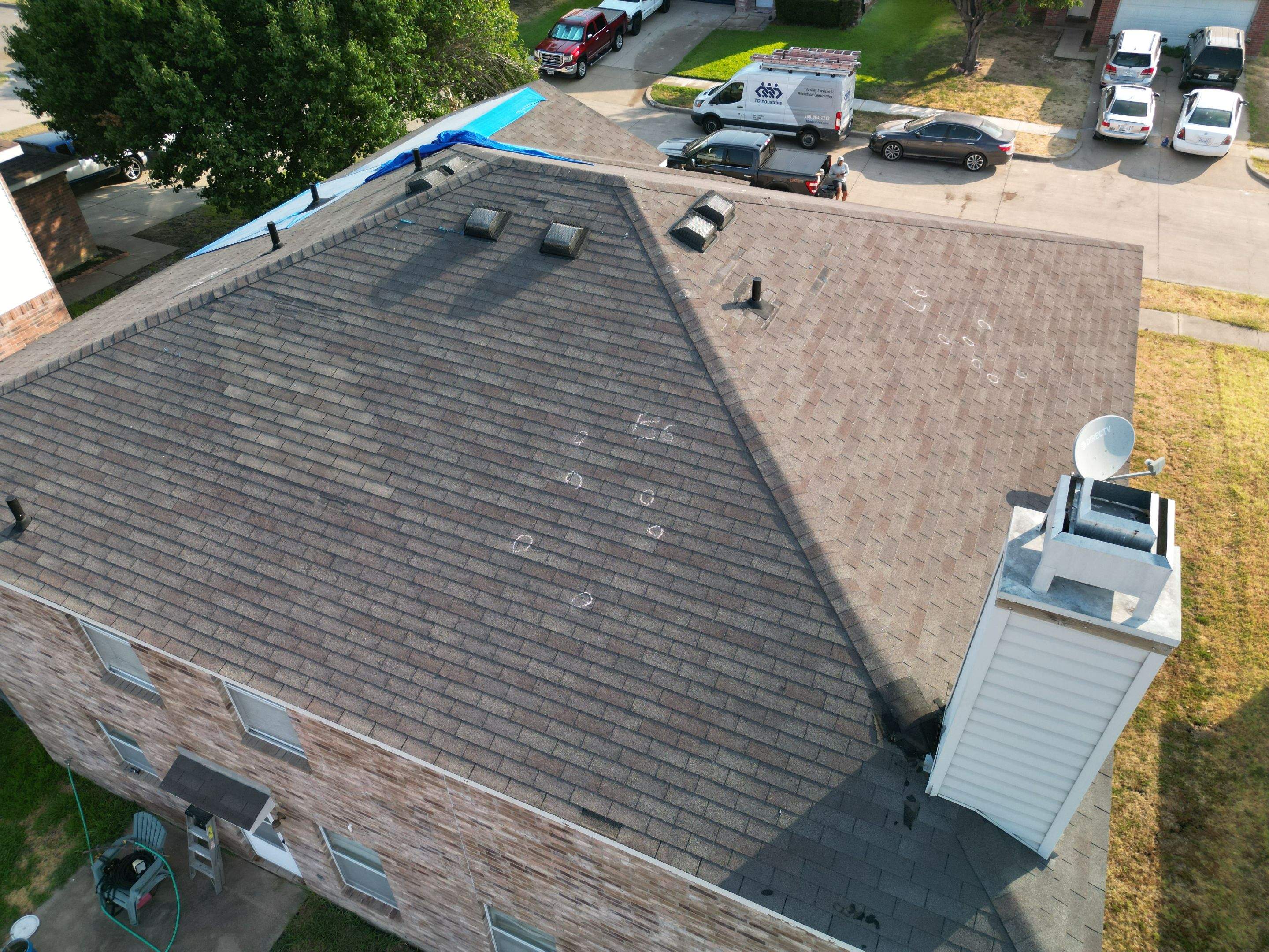 Full Roof Replacement, Chimney Rebuild and Interior Damage Replacement by First United Roofing & Construction
