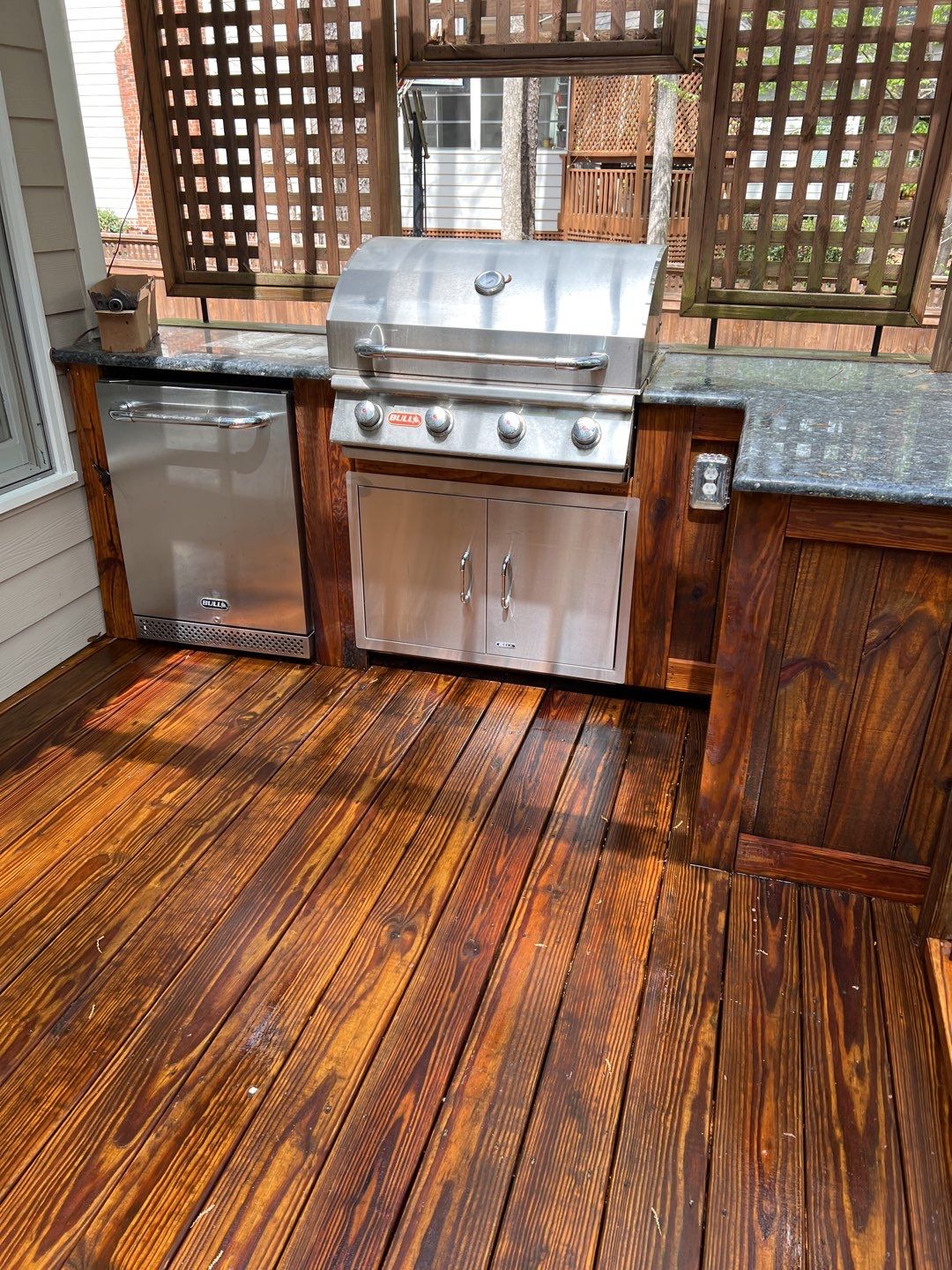 Deck and Stamped Concrete Patio by DuraSeal