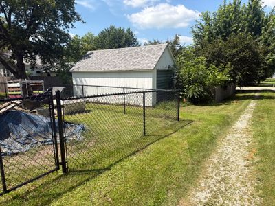 Black Chain Link Backyard Fence Installation in Tripoli, IA