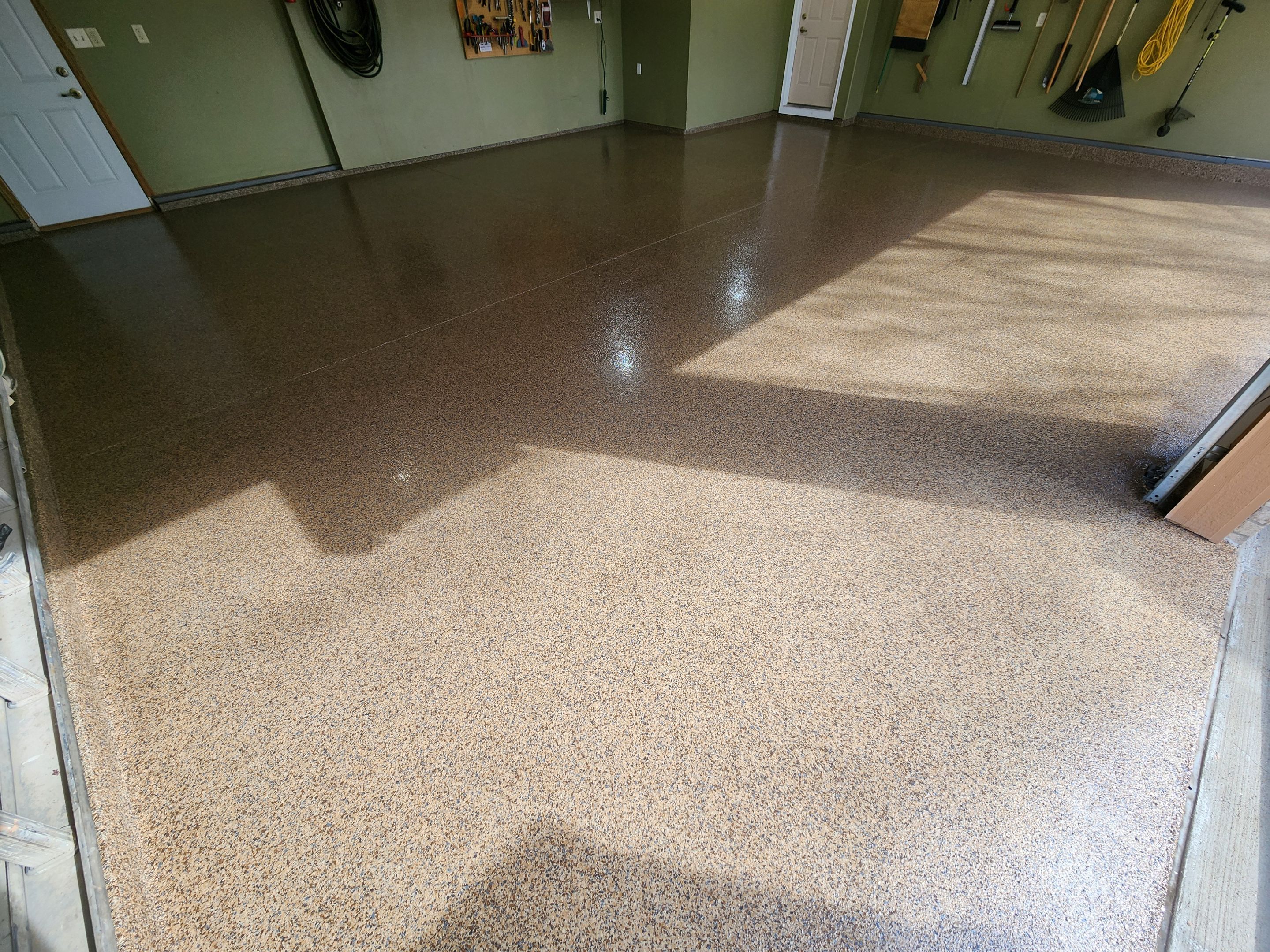 Sioux Falls Garage Floor Concrete Coating with Textured Aggregate by Select Painting, Coatings & Garage Cabinets