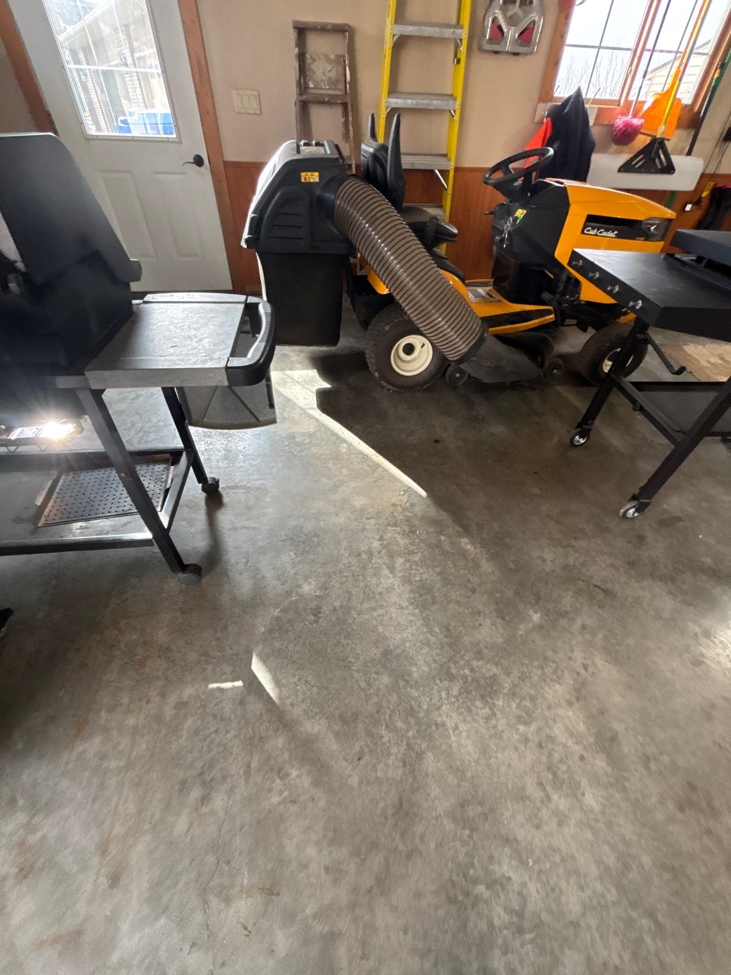 Multi-Fleck Epoxy Garage Floor Coating in Dell Rapids by Select Painting, Coatings & Garage Cabinets