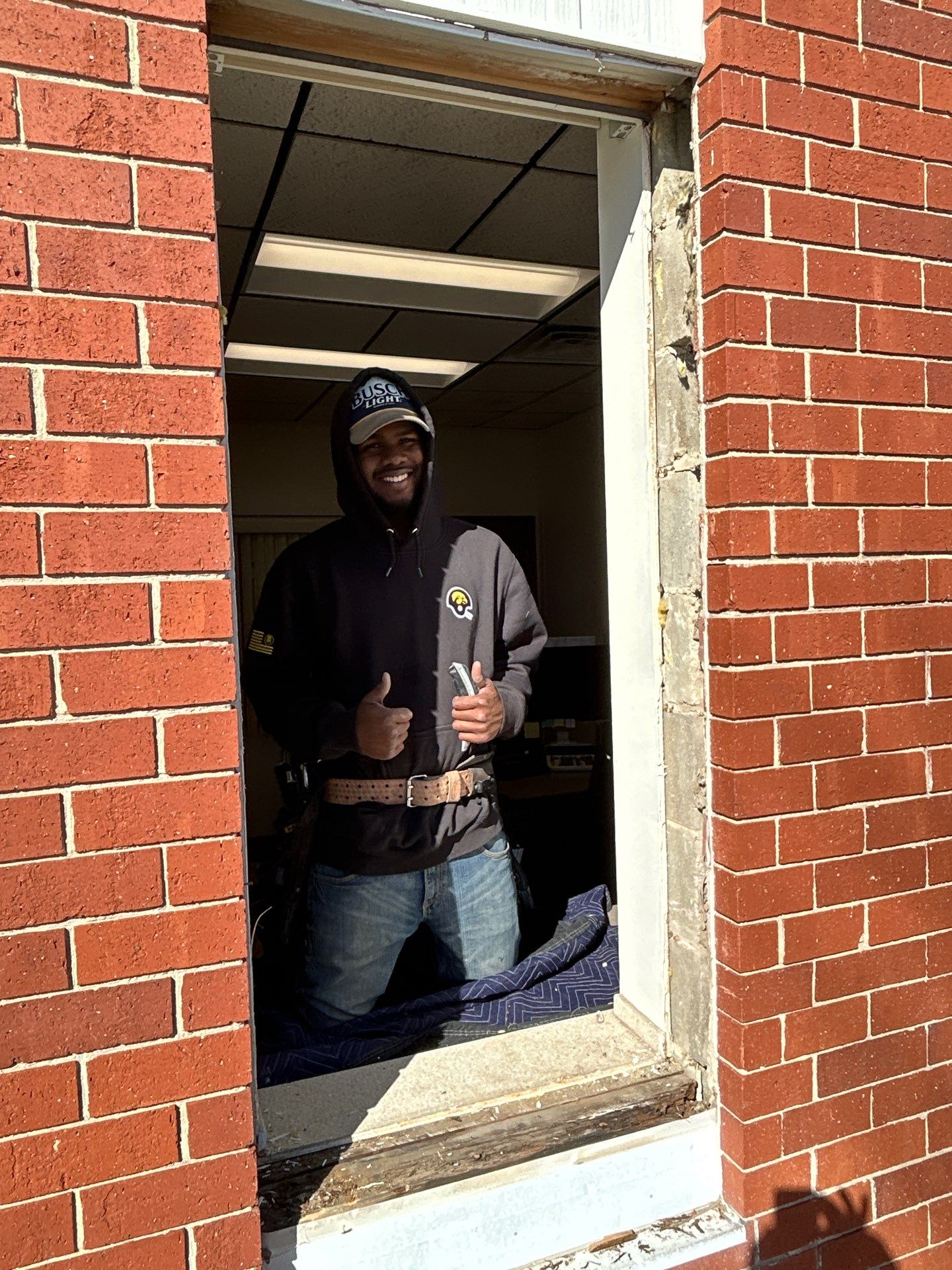 Pella Window installation using Pella Lifestyle wood/Aluminum window by United Windows and Siding LLC