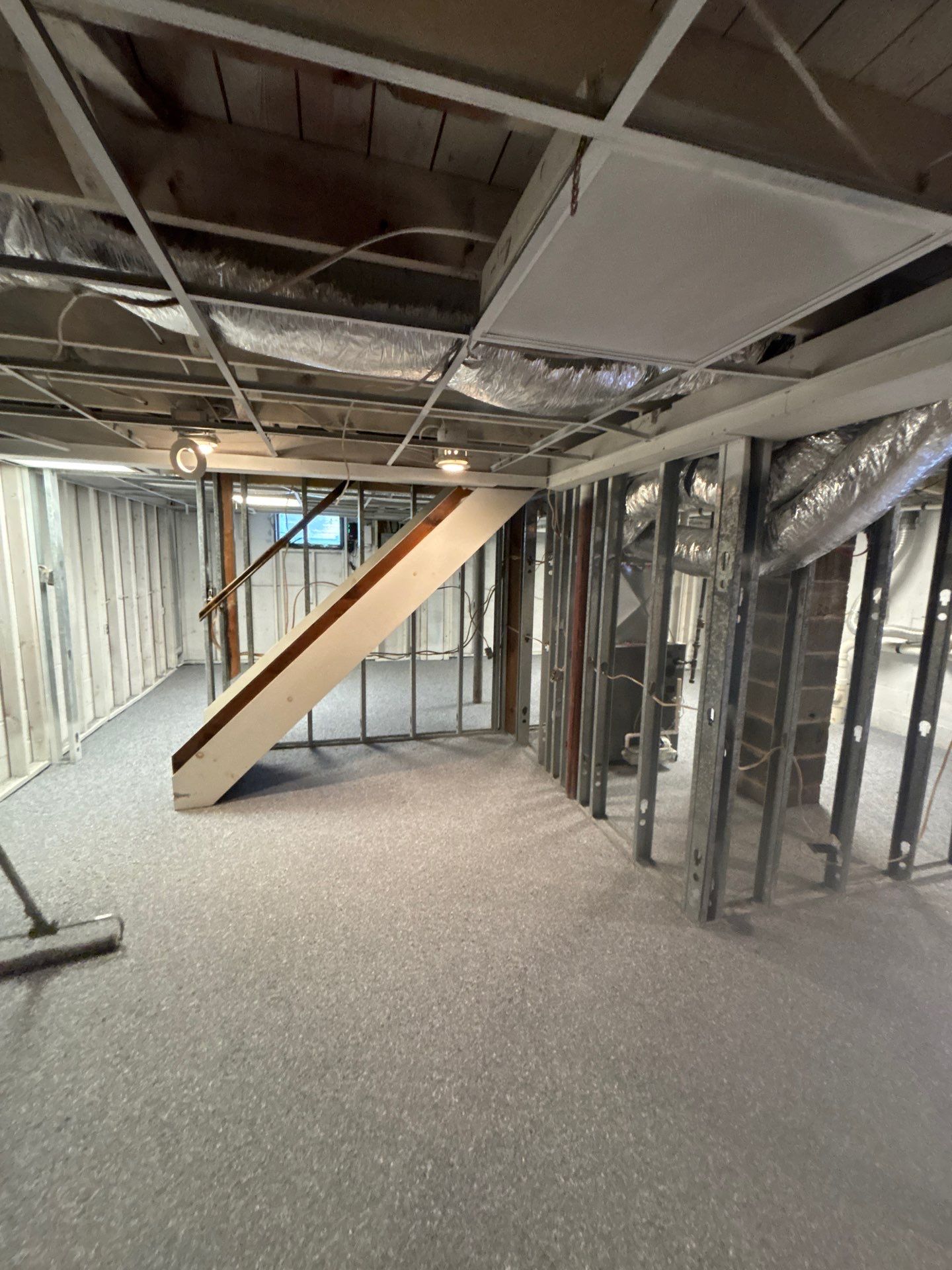 Basement Concrete Floor Coating with Penntek Flake System by Spectrum Painting, LLC