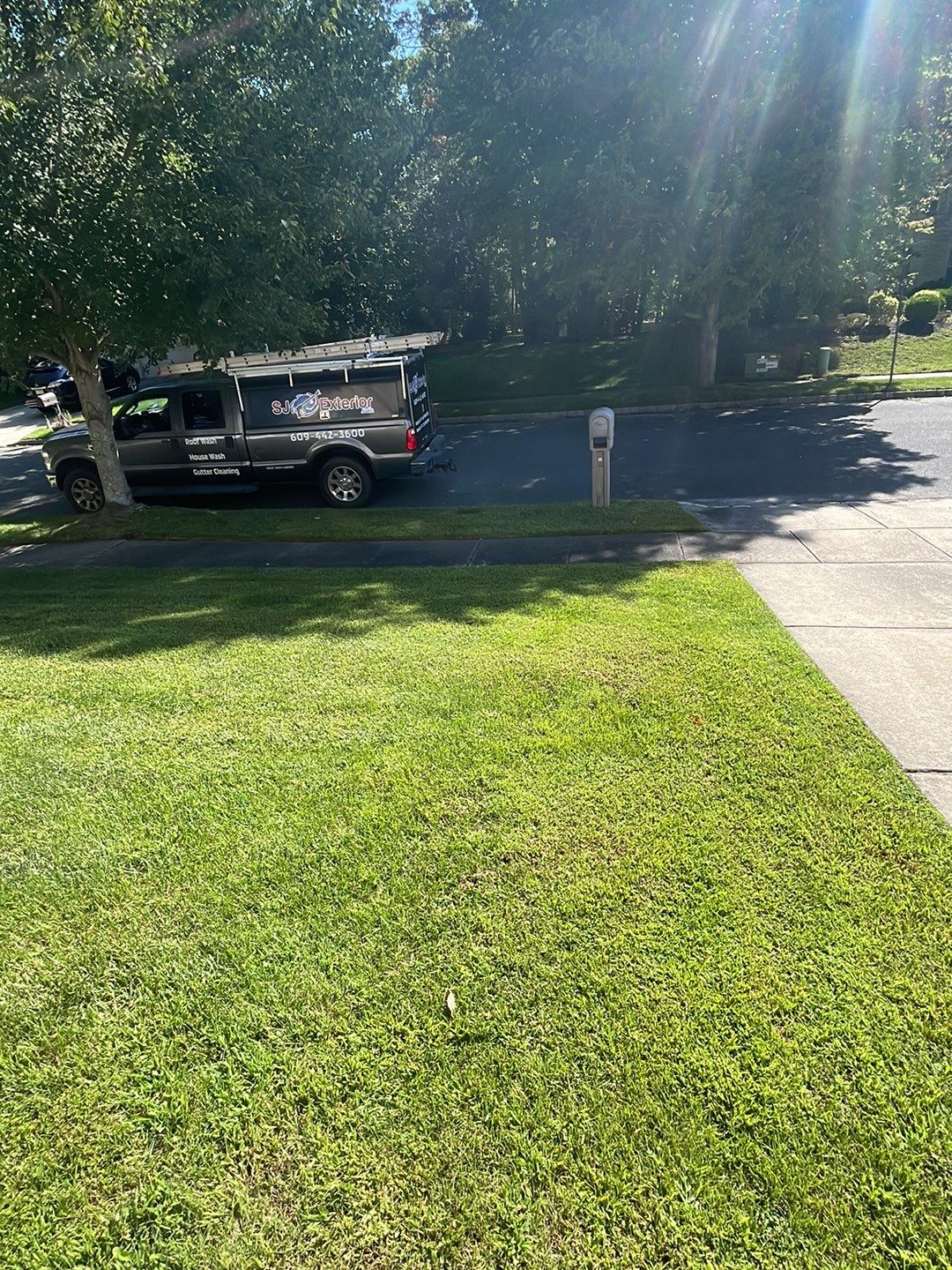 Amazing transformation-House SoftWash & concrete Cleaning by SJ Exterior