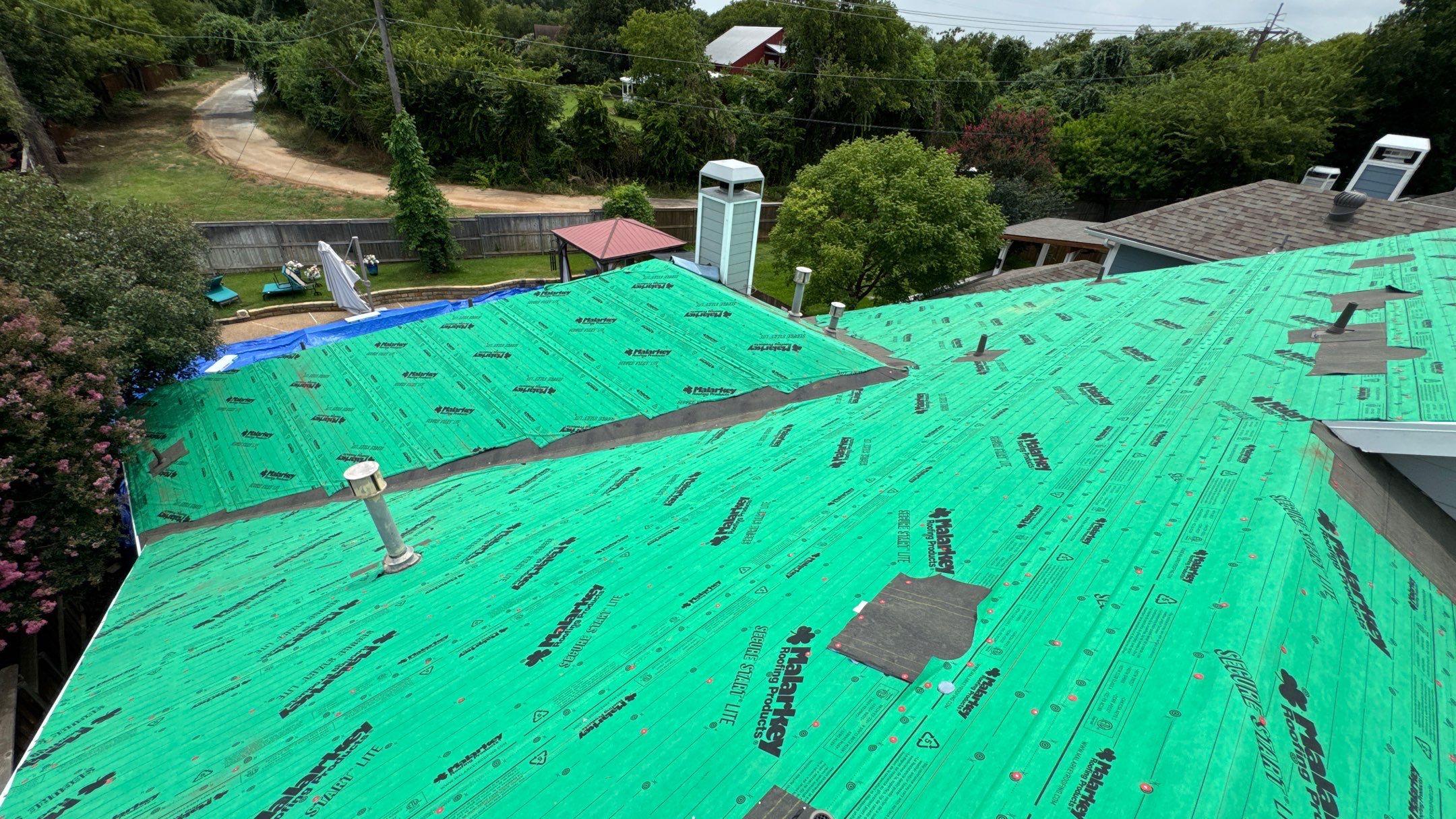 Residential Roofing Installation using Malarkey Secure Choice Roof System by Harvey Roofing & Construction