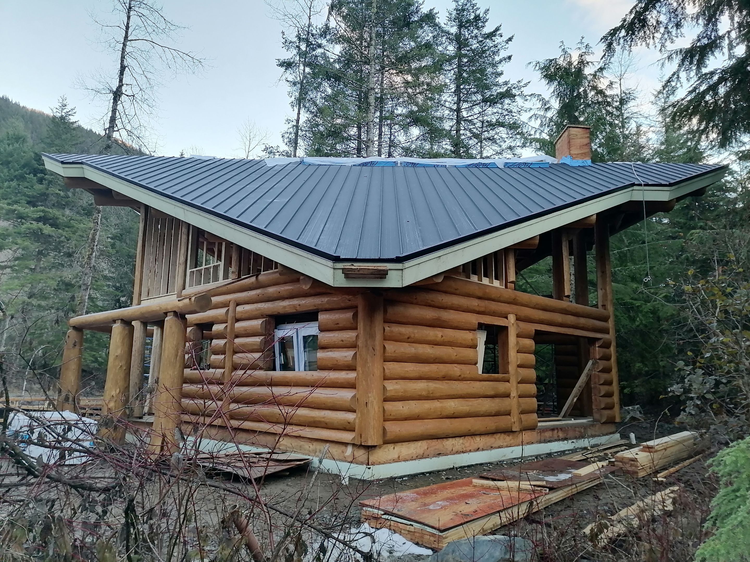 Residential Roofing Installation using 12" Prolok metal  by Top Notch Roofing Inc