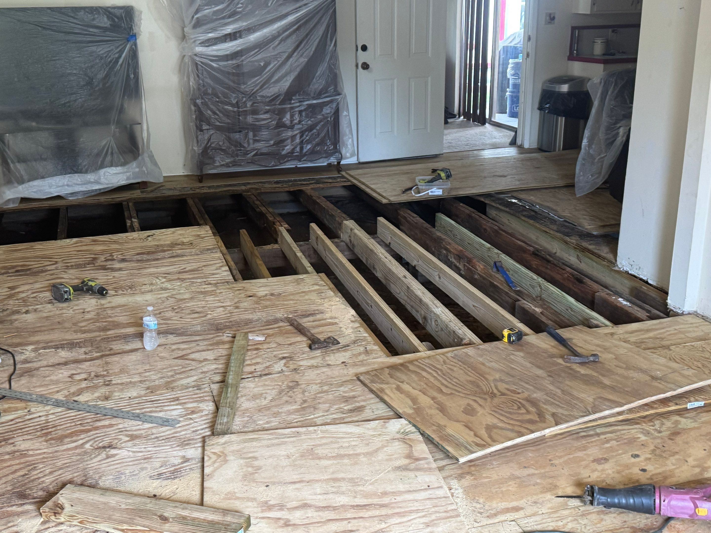 Water dry rotted flooring by Harden Enterprise Services LLC