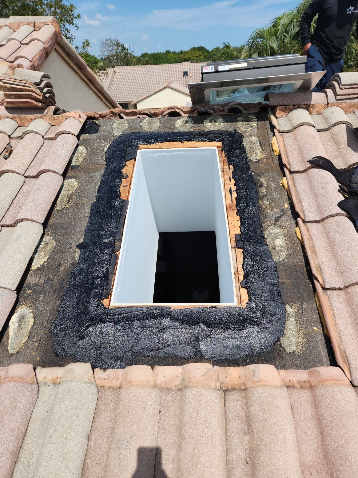 Concrete Tile Roof Repair using Skylight by Aastro Roofing