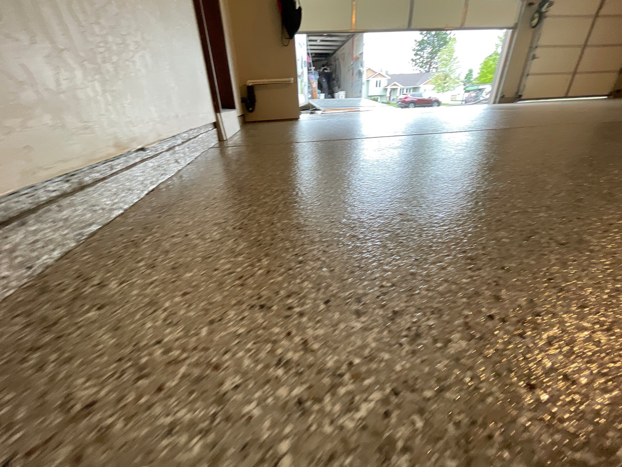 Garage Transformation using Pebble Beach and Front Porch using Greystone by Croc Coatings, LLC