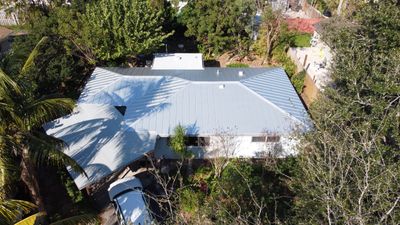 Residential Roofing Installation using 1" Nail strip metal roof