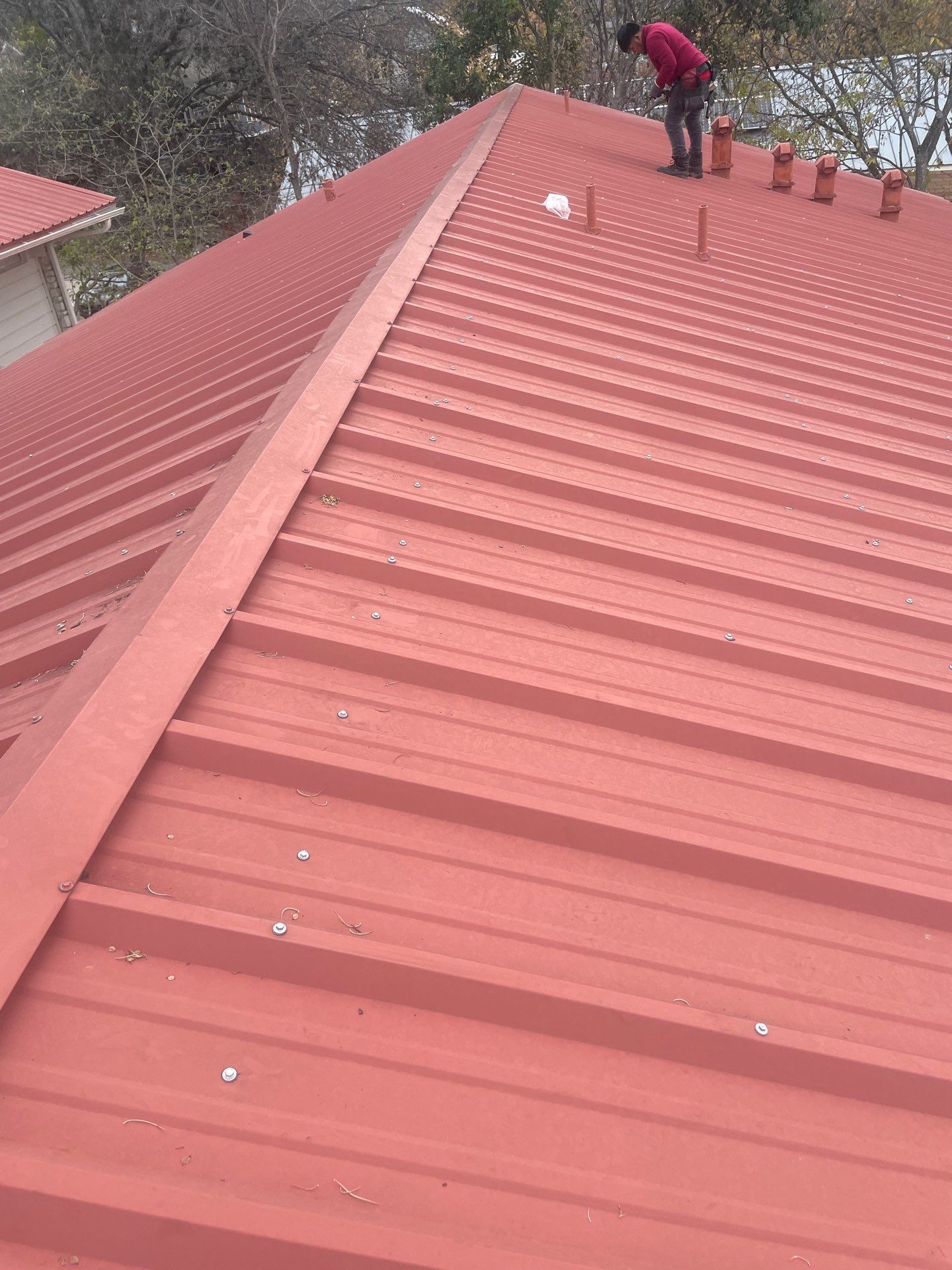 Metal Roof Restoration for Austin Condo Community by Cool Roofs