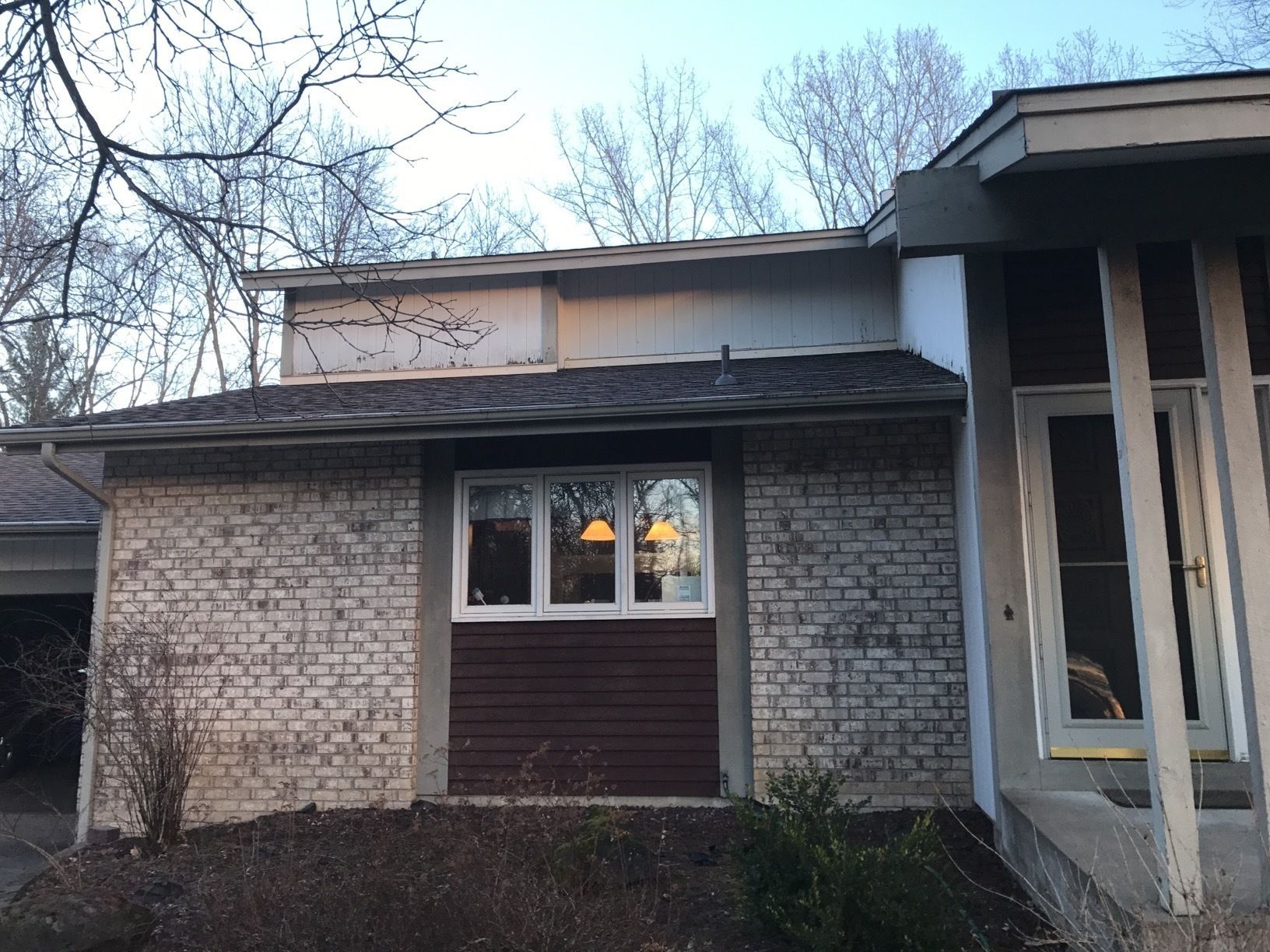 Siding Installation using LP SmartSide and Pella Vinyl Windows by MODERN EXTERIOR SYSTEMS