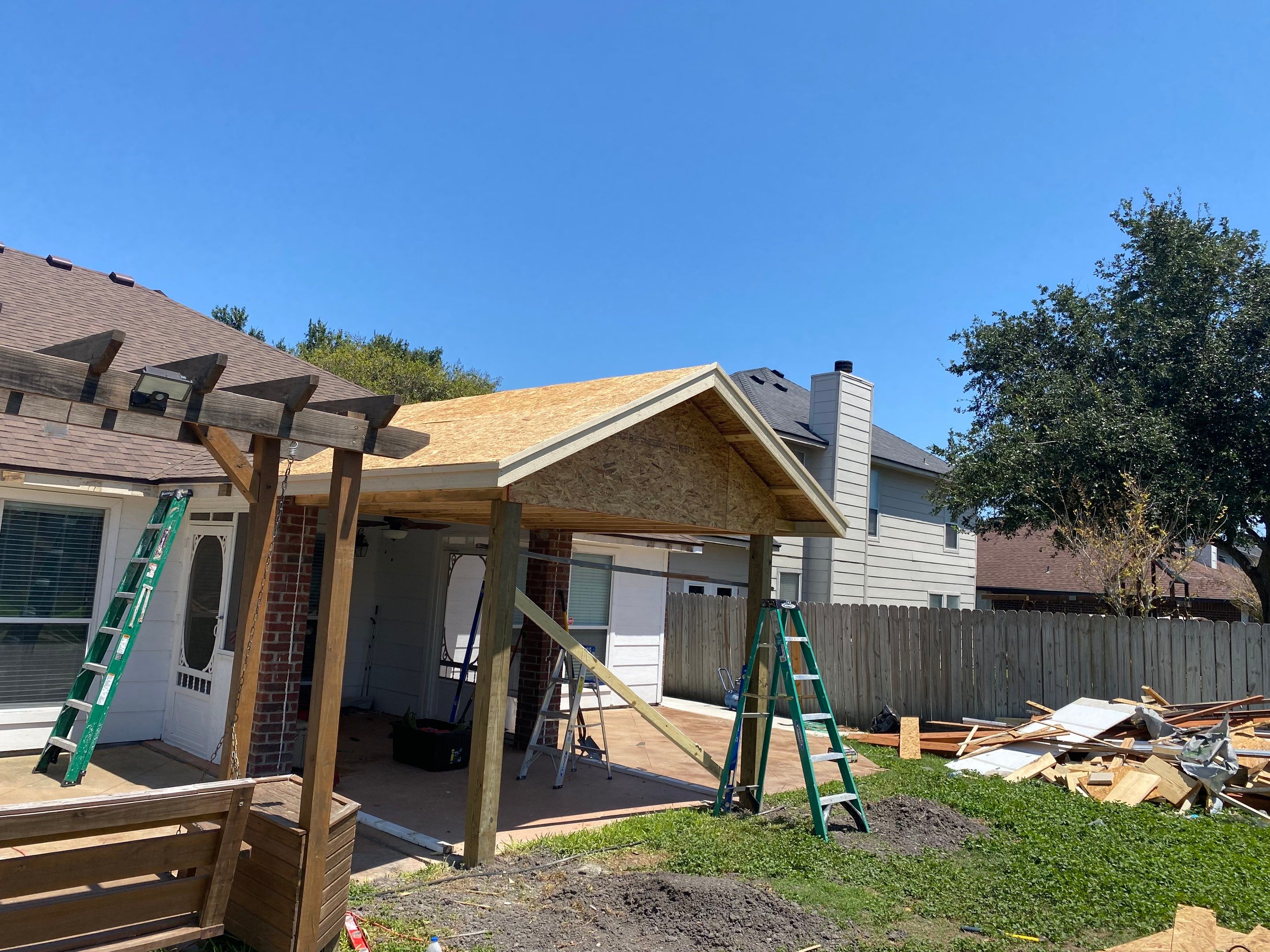 Back Yard Shade by Bayfront Roofing and Construction