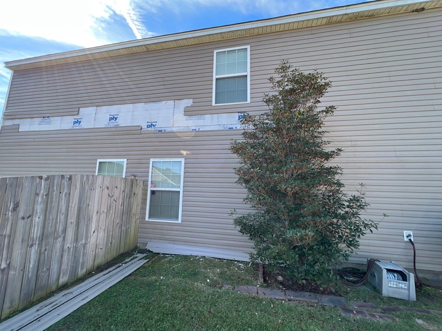 Replaced Wind Damaged Vinyl Siding by Midlands Roofing & Exteriors