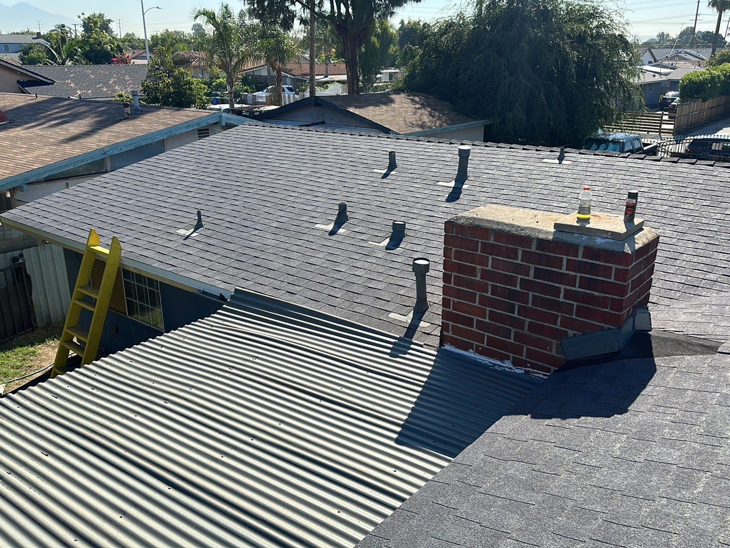 Estate Gray Shingles by Reimagine Roofing