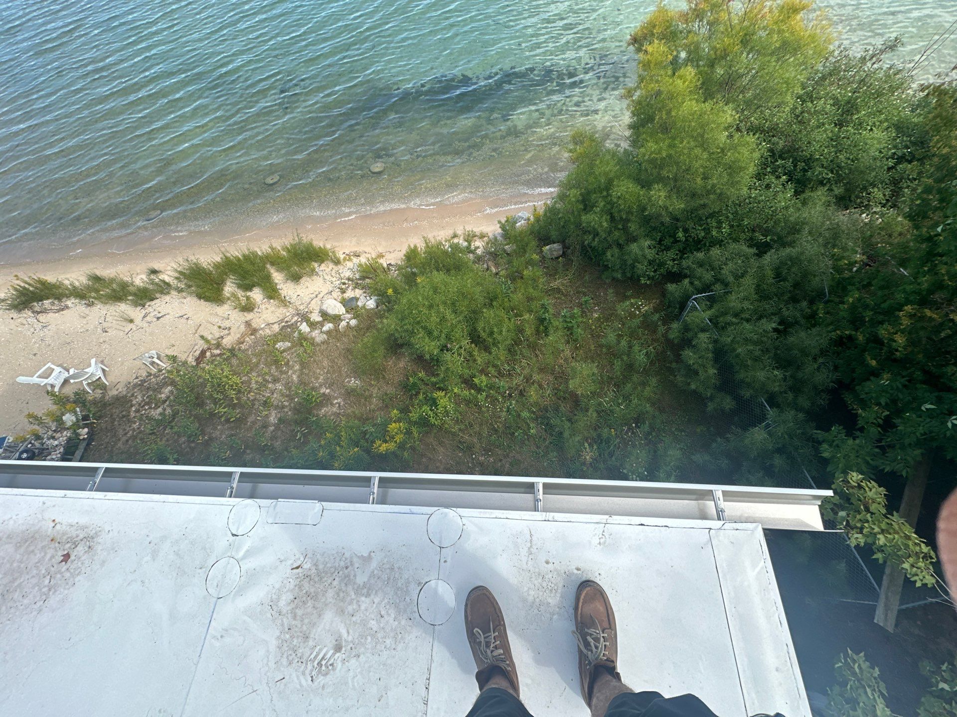 New Gutter System Installation for Suttons Bay Waterfront Home by Rainbow Seamless Systems