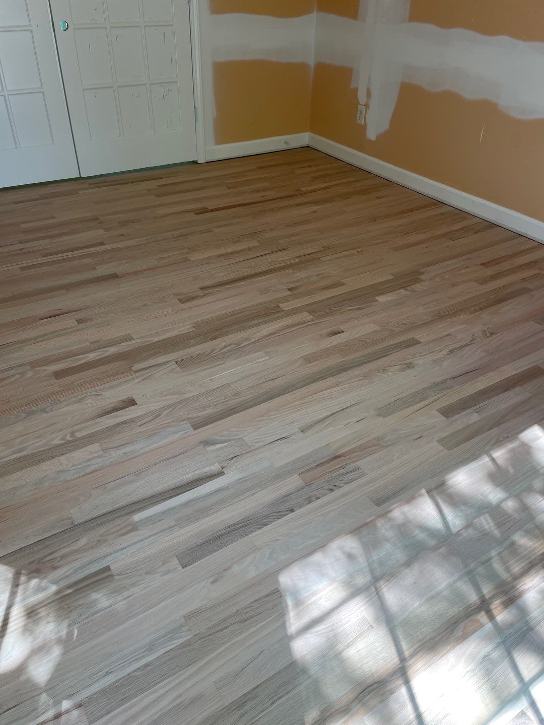 Red oak floor refinishing by Accent Custom Floors