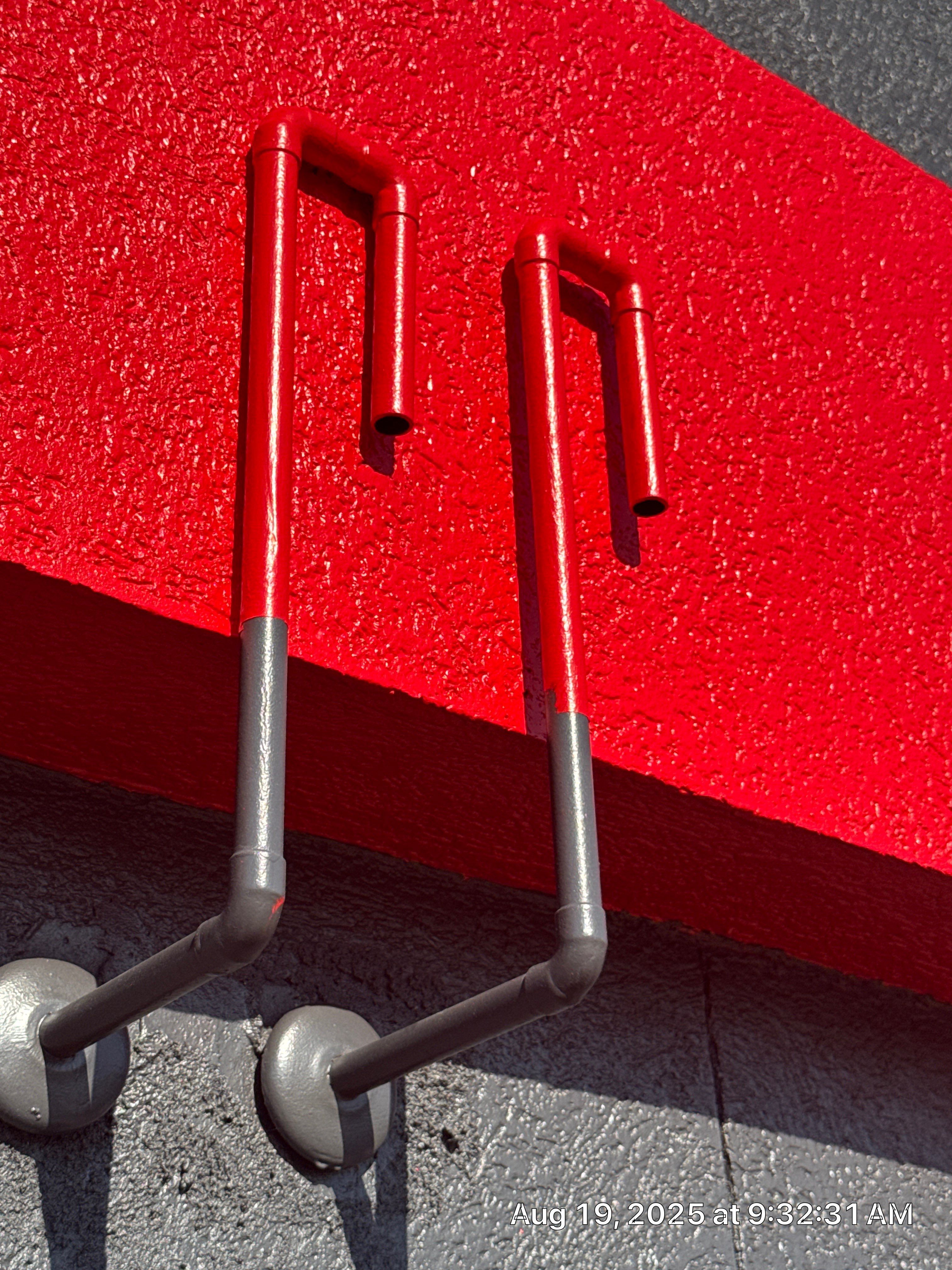 Commercial Exterior Painting with Stucco and Bold Red Accent Trim by Select Painting, Coatings & Garage Cabinets