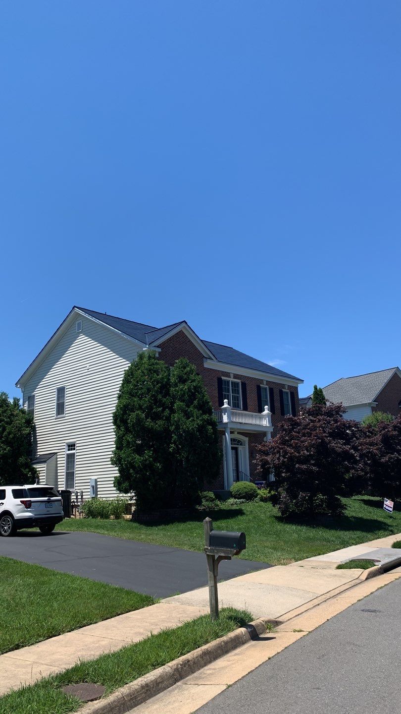 Tesla Solar Roof Replacement using Tesla Solar Roof V3 tiles by American Home Contractors