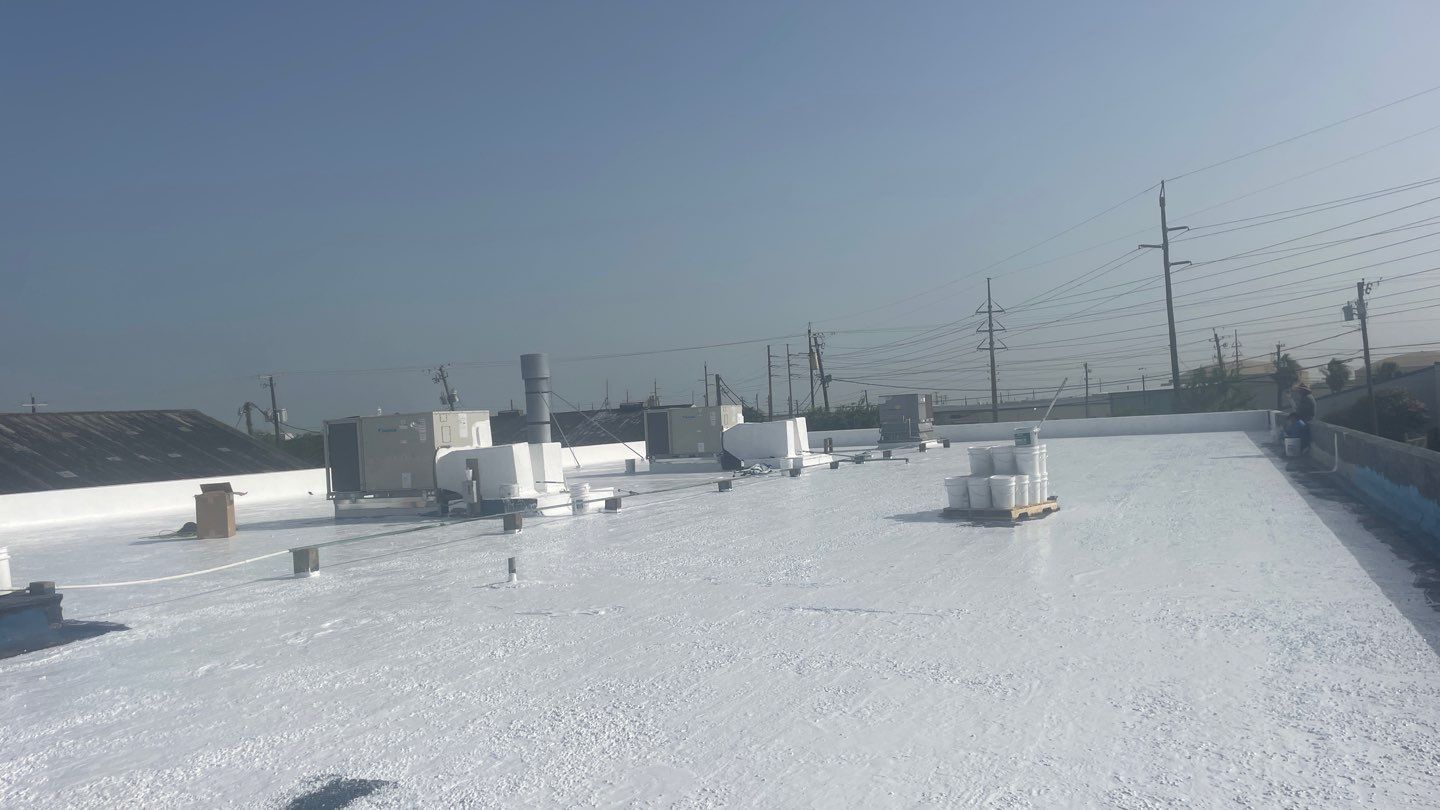 Dirty leaking Gravel Roof by Bayfront Roofing and Construction