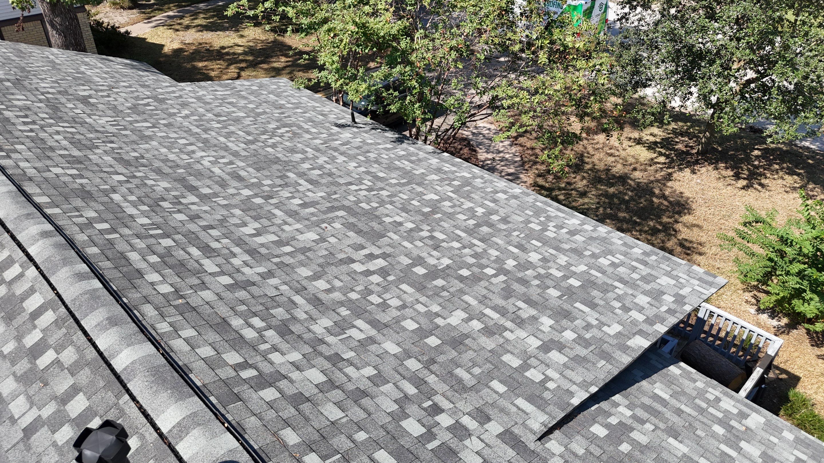 Roof Replacement after a 90-foot tree fell on it! by Core Four Roofing