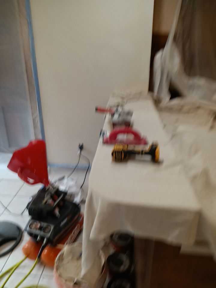 Interior and exterior painting project by Roof Concepts Construction
