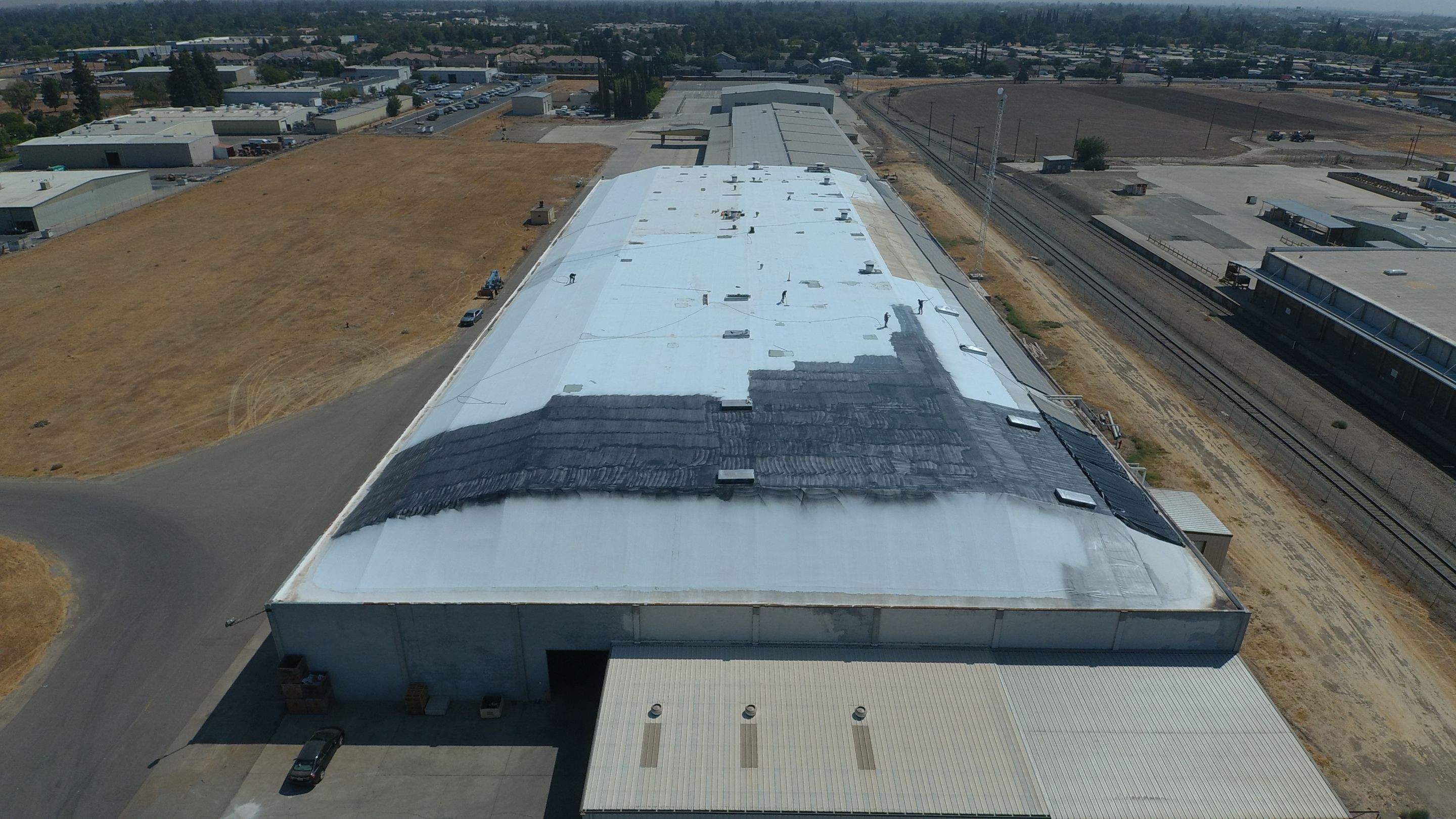 Single-ply restoration system using Conklin Benchmark/PUMA XL fabric and coating by Straight Edge Roofing Inc