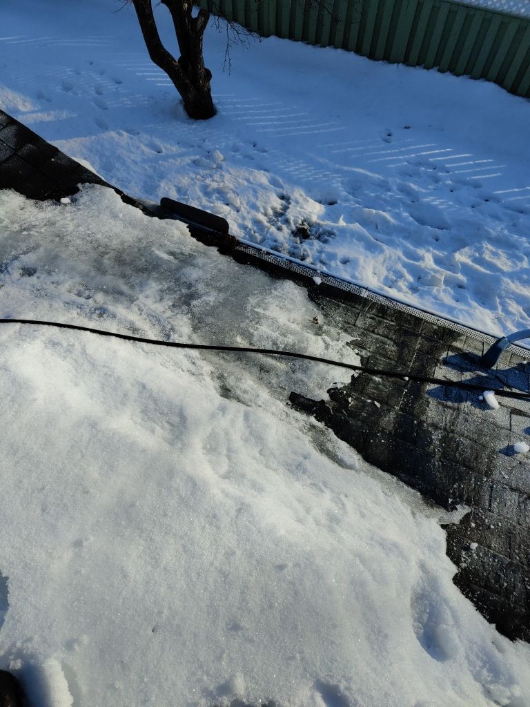 Steaming and Installing New Covers and Heating Cable by Next Level Seamless Gutters / Exteriors Inc.