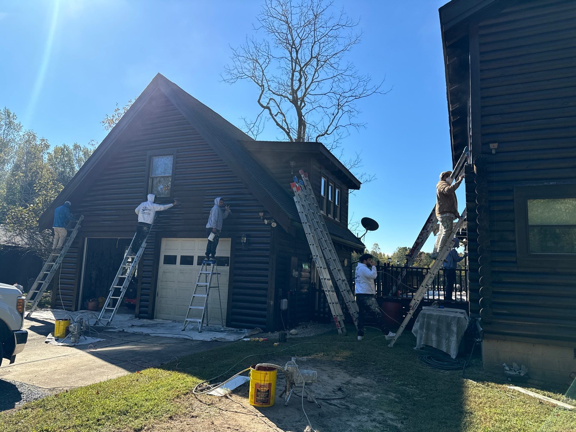 Smithfield Log Cabin by AKK Painting LLC