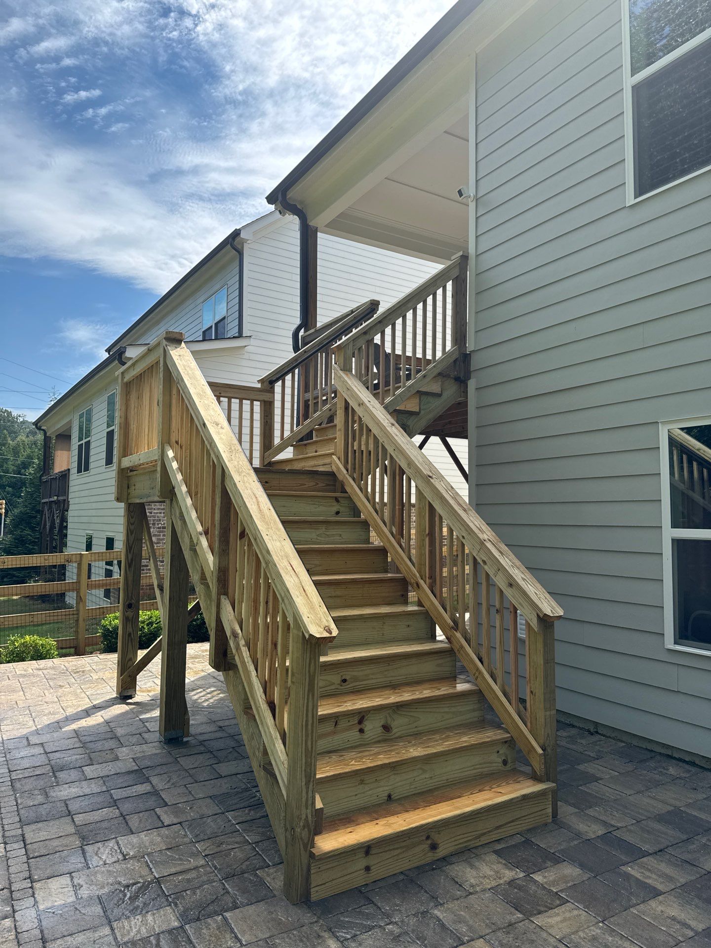 Elevated Deck Stair Construction and Paver Patio in Marietta by Swift Home Renovations
