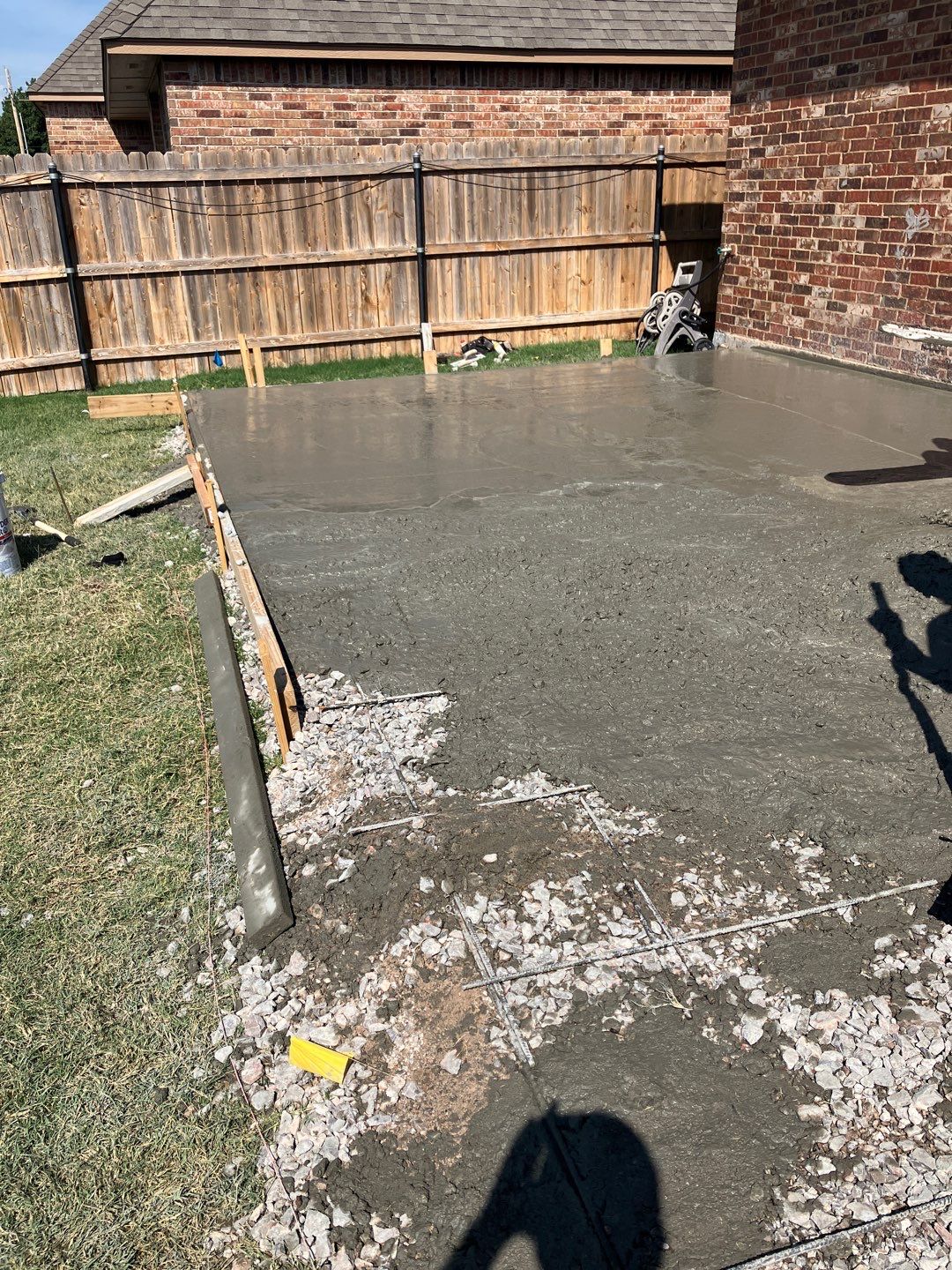 Concrete slab with Pergola by Clays Services Inc