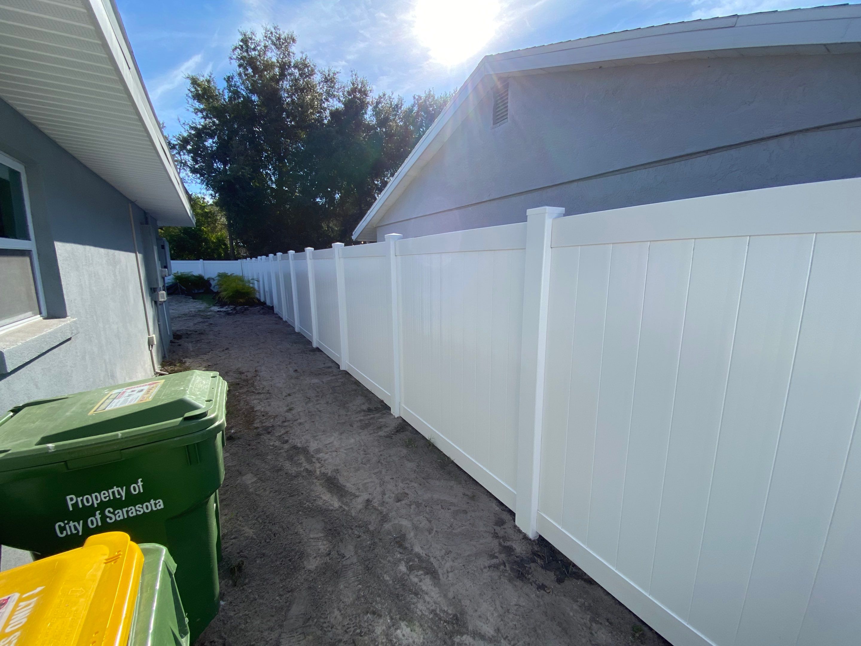 Vinyl Privacy Fence With AC Enclosure and Storage Corral by Asap fence and gates, LLC