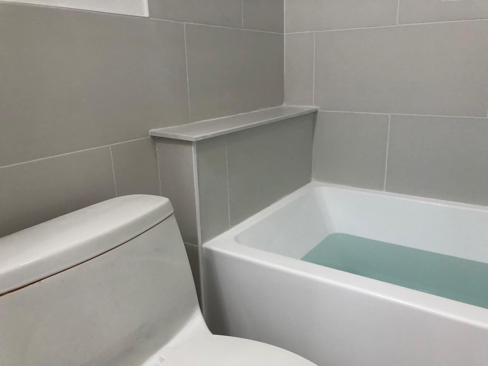 Bathroom Remodel using Tile by Home Concepts Construction