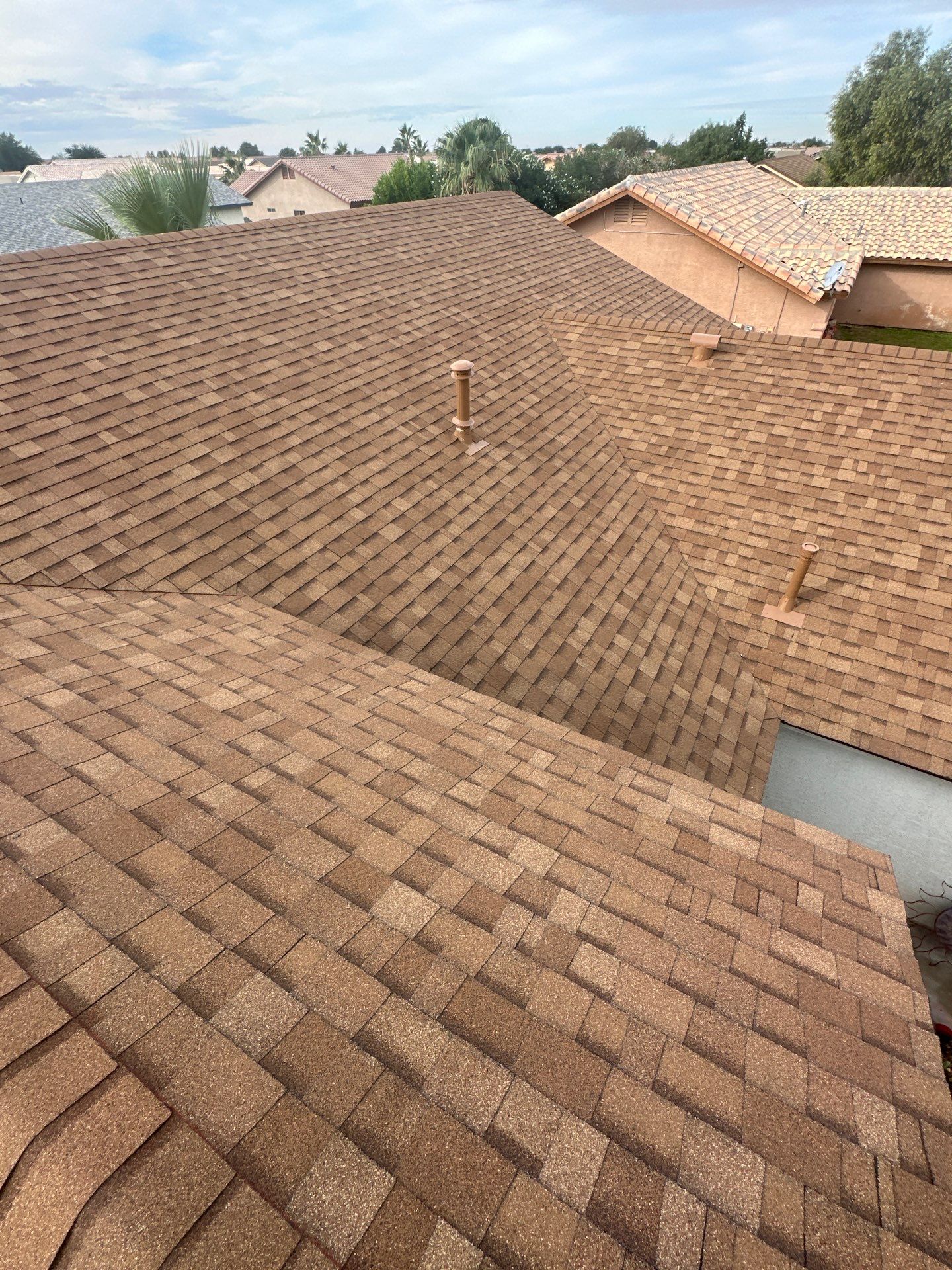Desert Tan Shingles by Reimagine Roofing