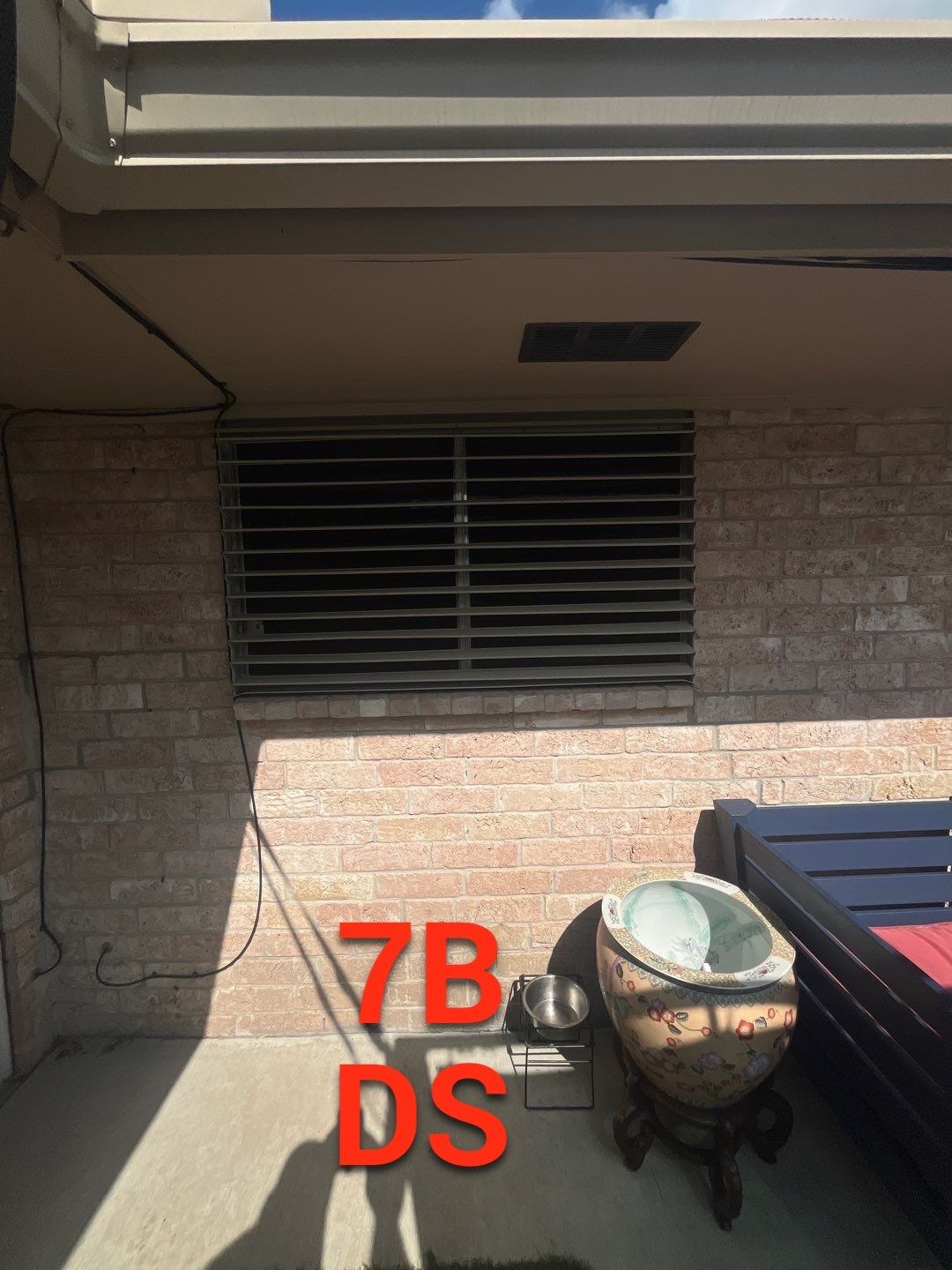 Colored Vinyl Windows to blend into brick by Bayfront Roofing and Construction