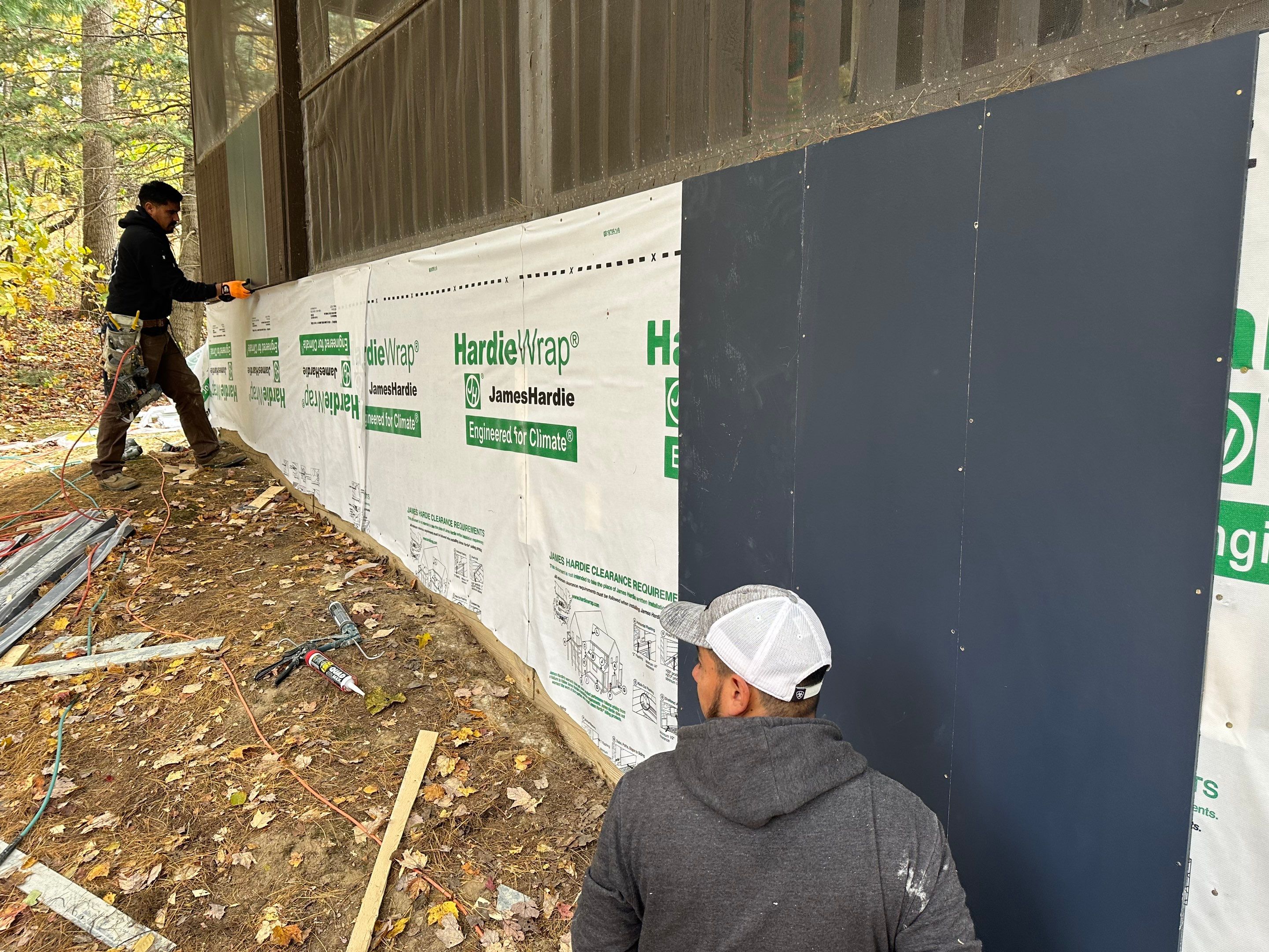 Siding Installation using James Hardie Board & Batten Siding by Best Roofing & Siding Company