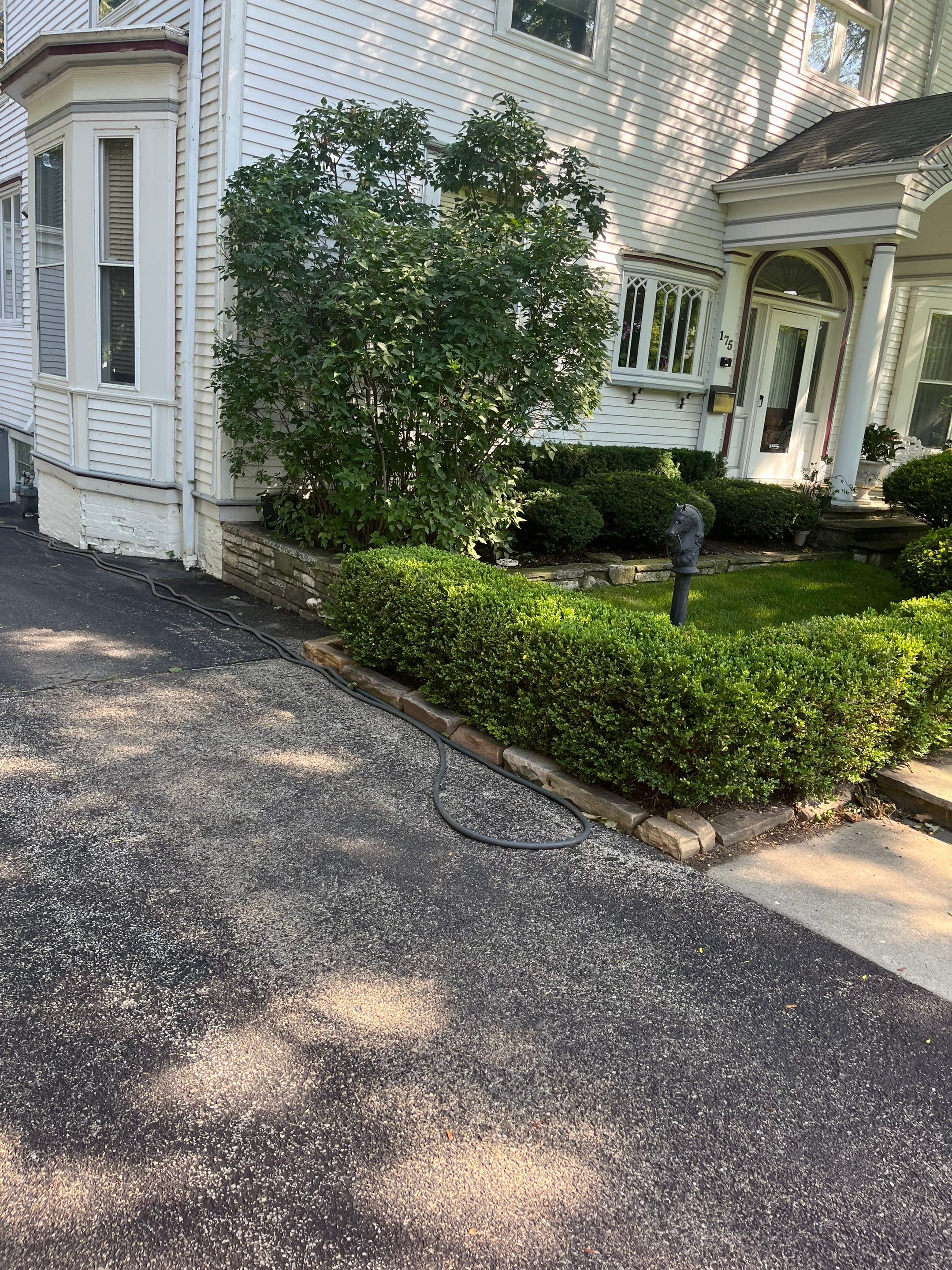 Housewashing  using Algaecide, soft wash soap by Northern Power Washing LLC.