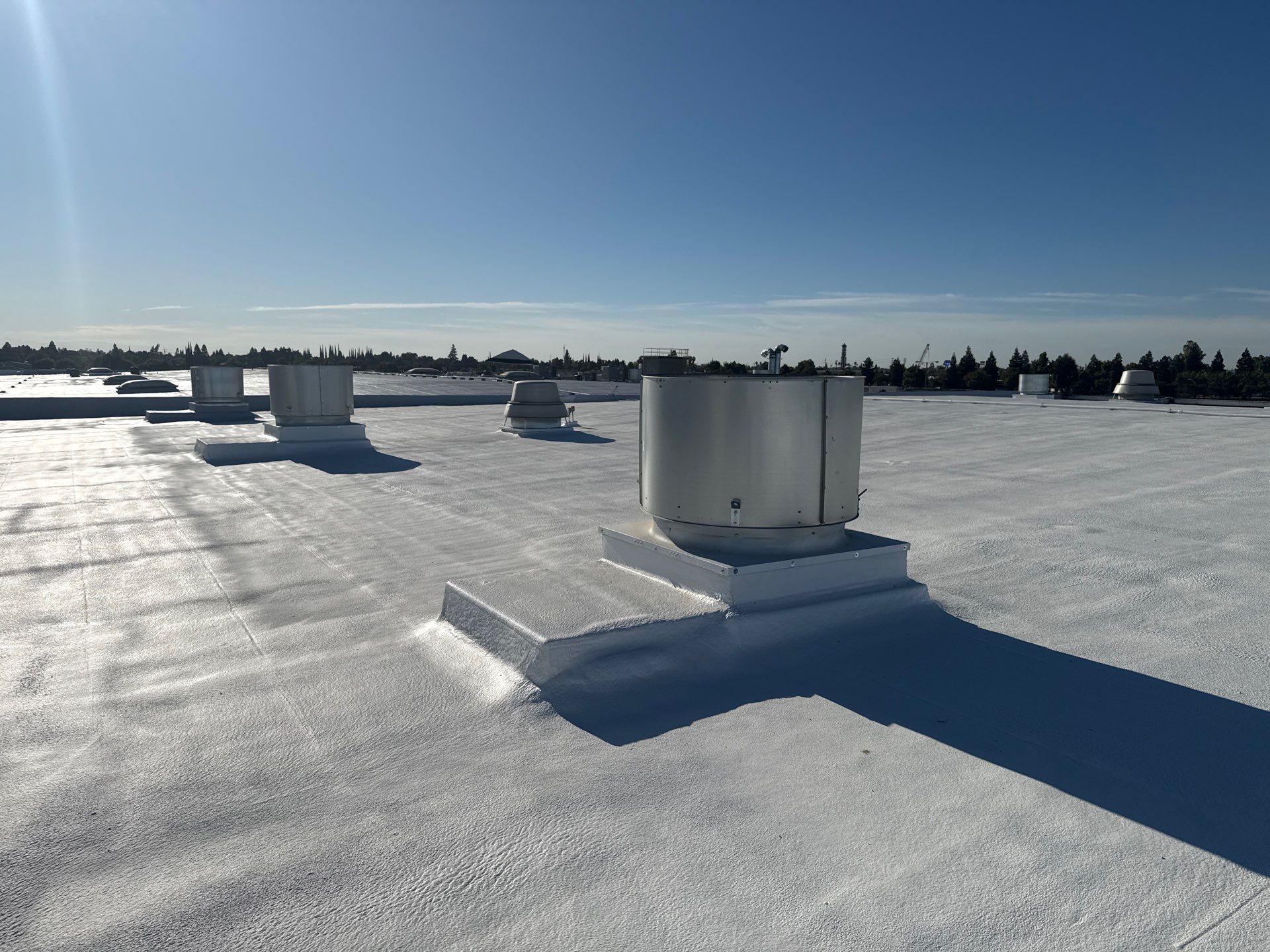 Pro Farms Spray foam roofing project by Straight Edge Roofing Inc