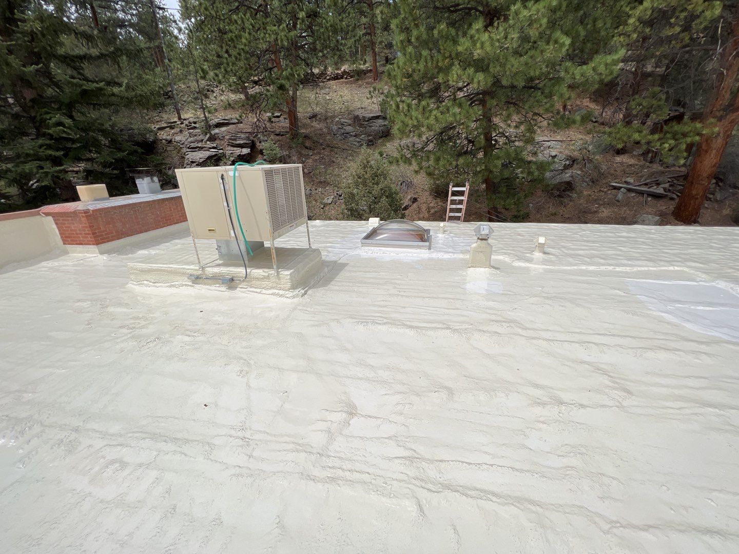 Commercial Roofing Installation using CASTAGRA ECODUR COATING by A to Z Roofing