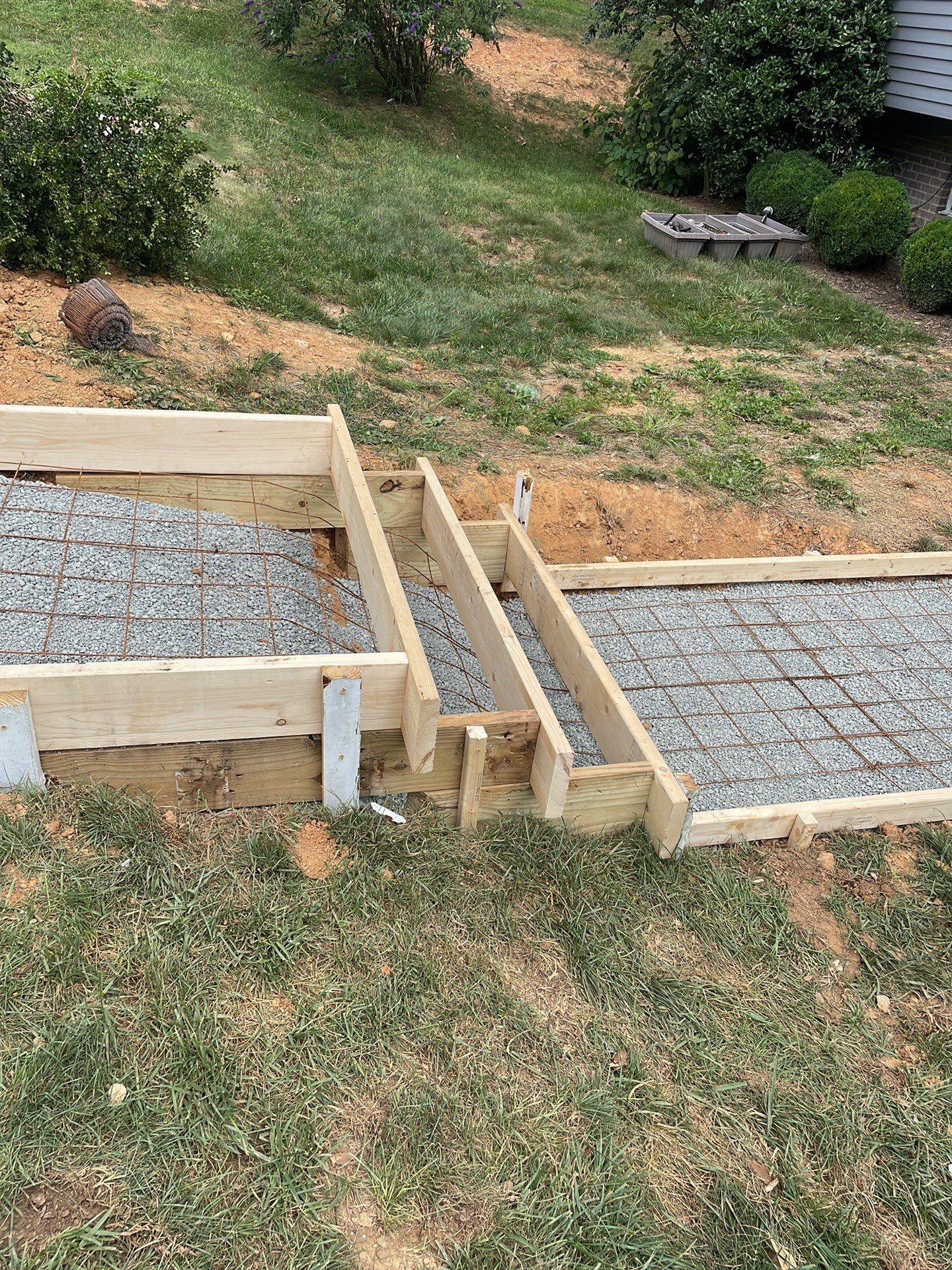 New walkway with stairs and a new front porch by Fairfax Contractors, LLC