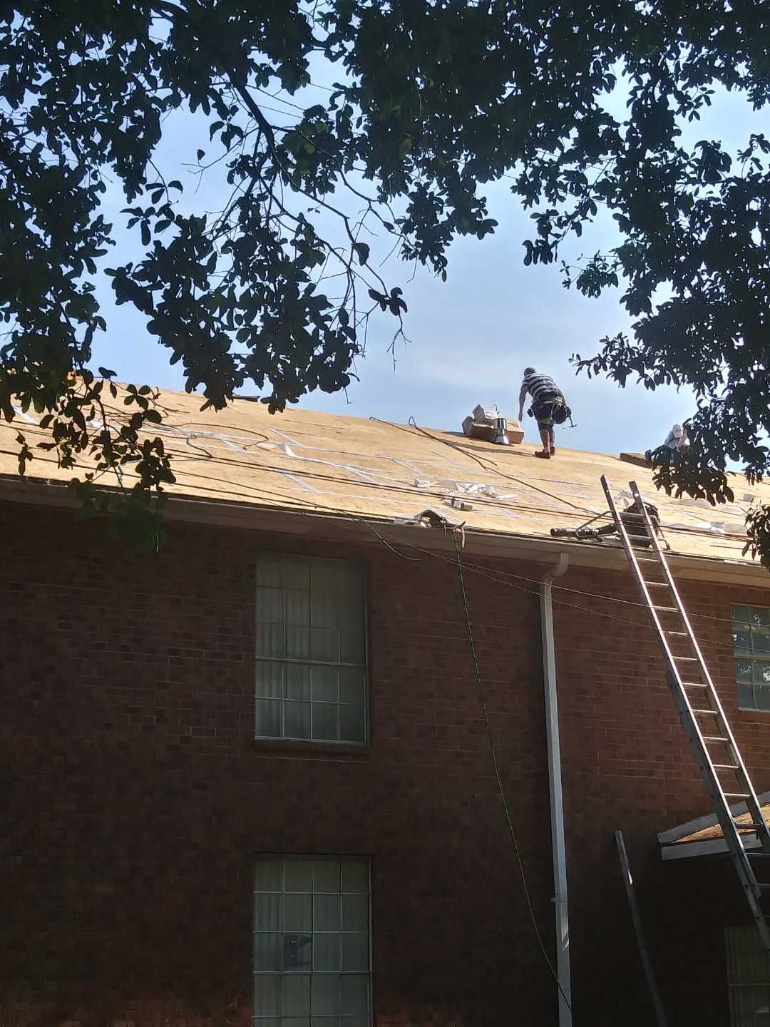 Residential Roofing Installation using Roof Replacement by American Roofing & Construction LLC