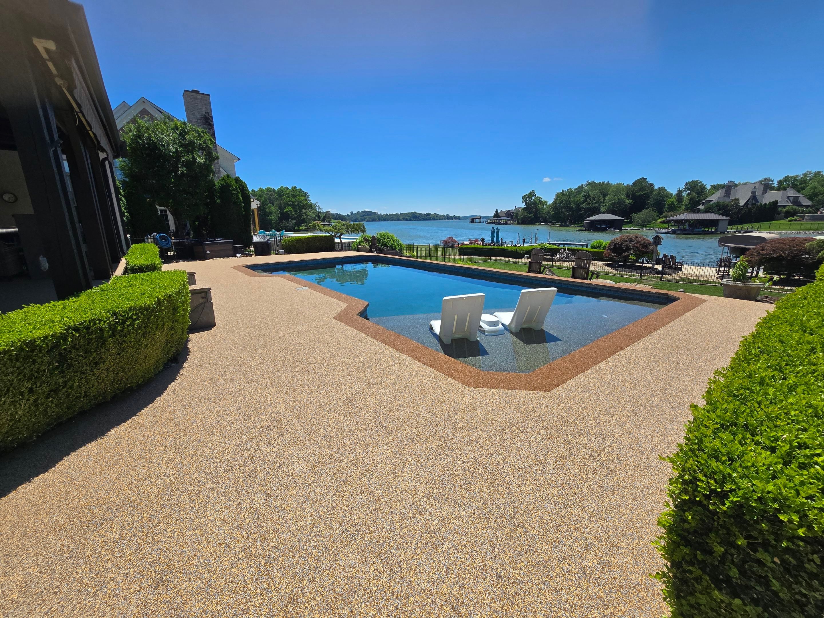 Lakeside Pool Resurface — Sandstone Rubaroc® with Medium Brown Border by Elite Floor Solutions