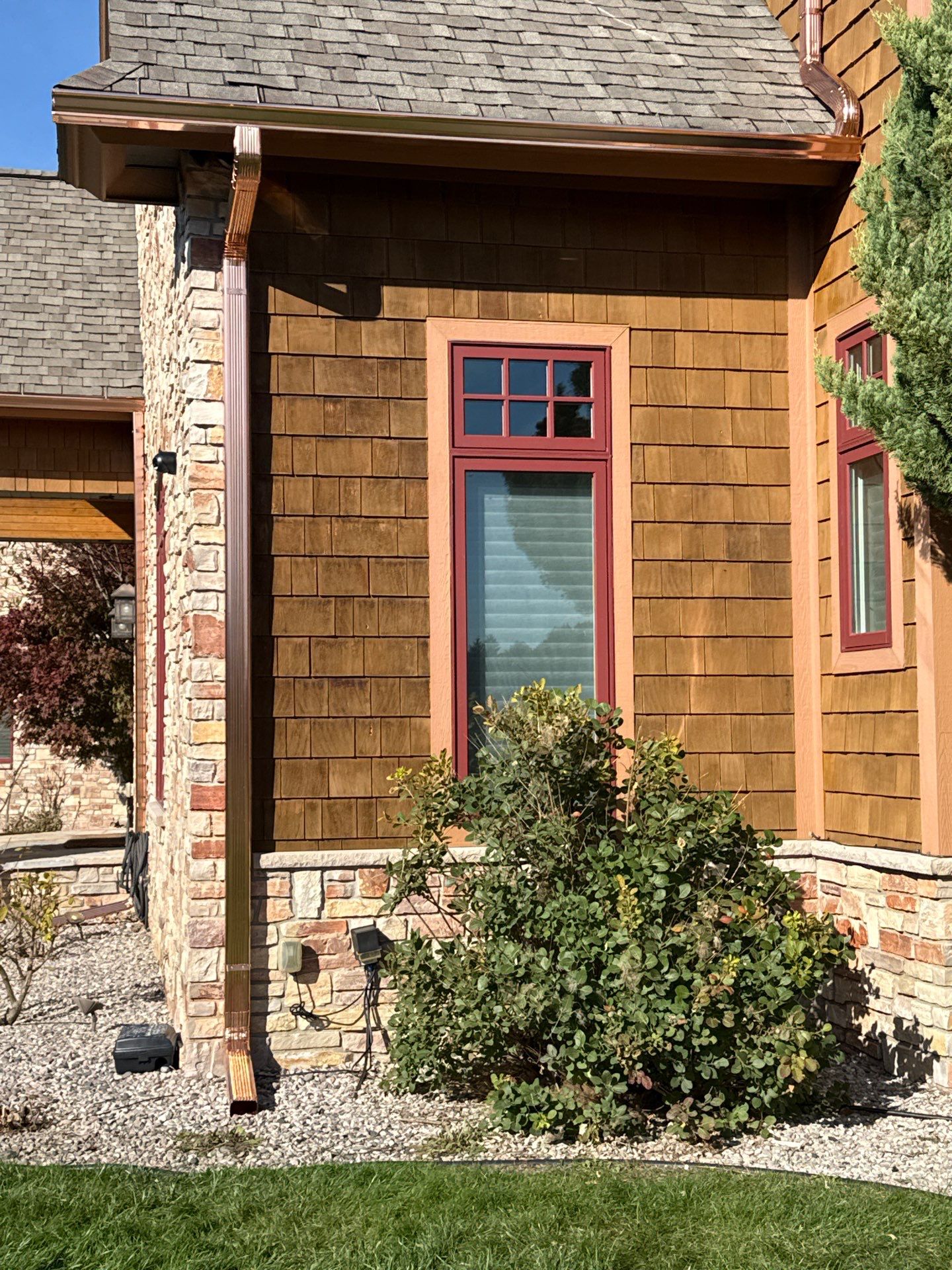 Custom Copper Gutter and Metal Downspout Installation in Williamsburg by Rainbow Seamless Systems