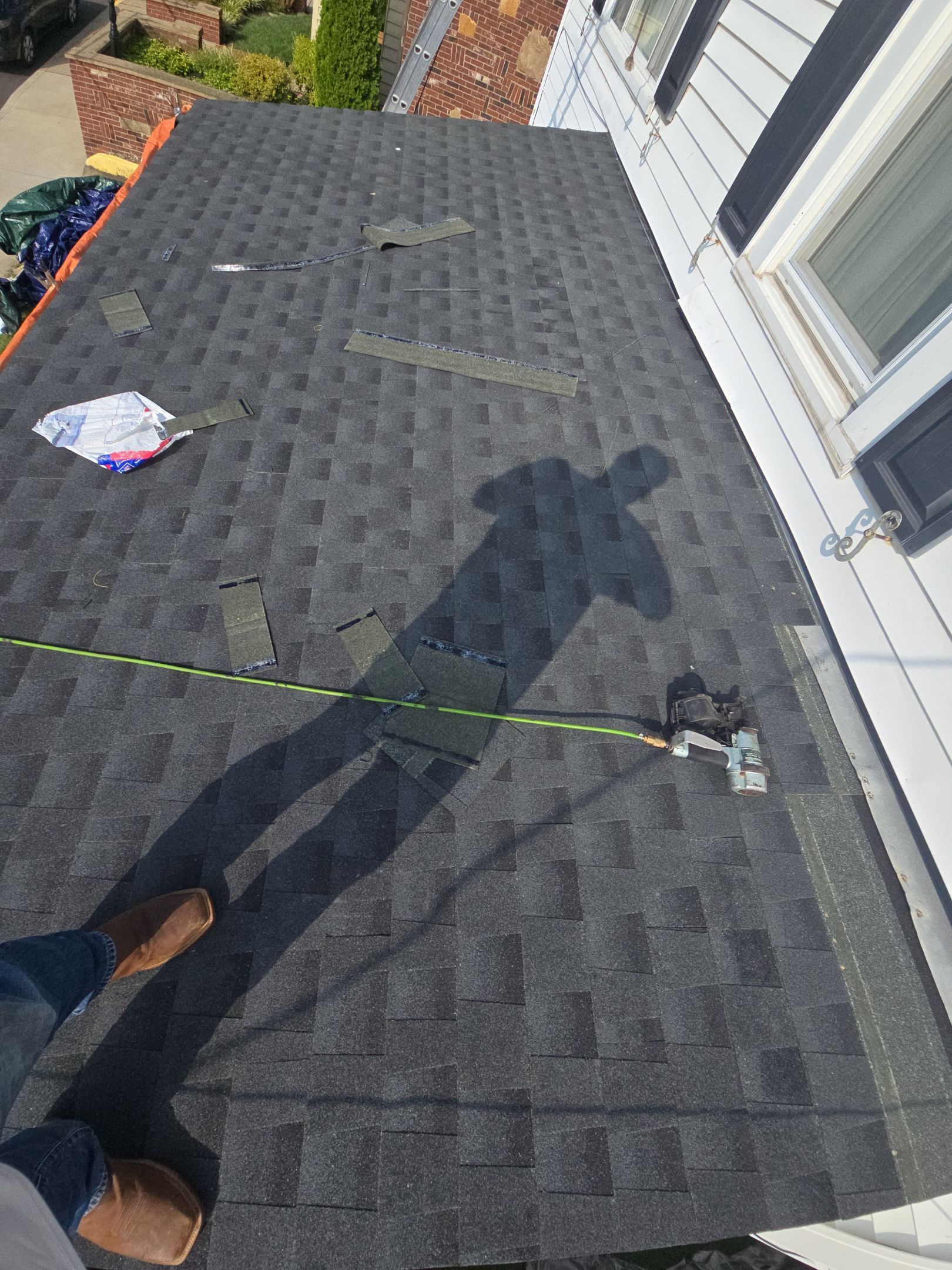 Residential Roofing Installation using GAF Timberline HDZ Charcoal by Rainstoppers Roofing