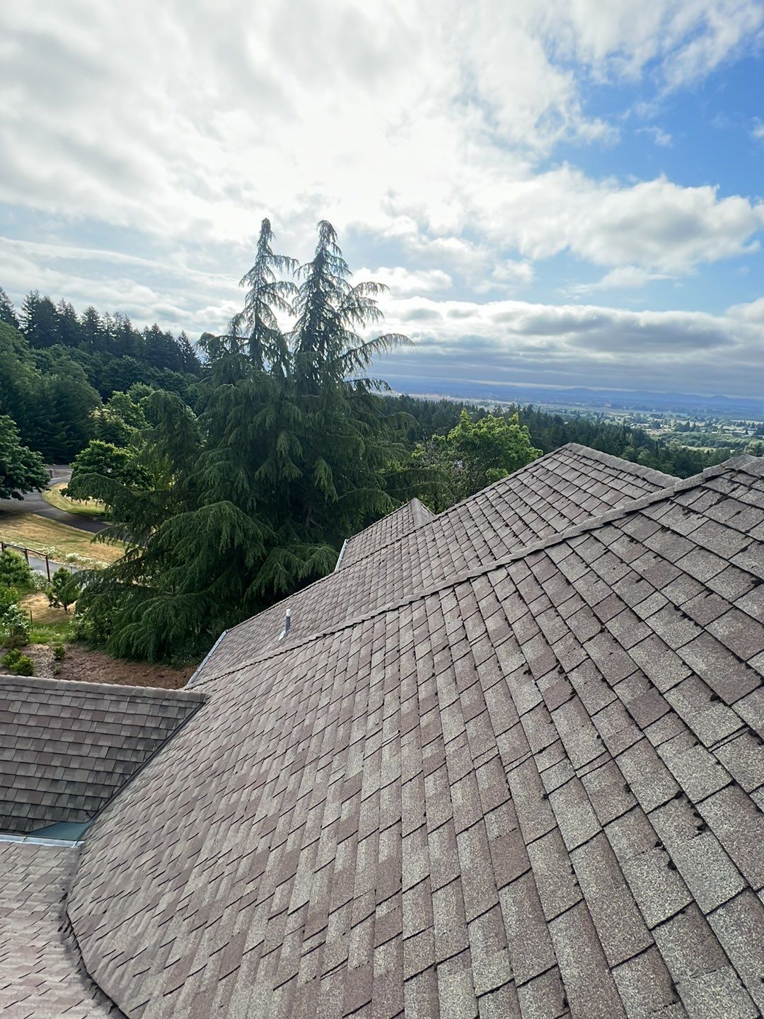 Residential Roofing Installation using Malarkey Windsor 50 Year Shingle (Color: Storm Grey) by Orezona Building & Roofing Company, Inc.