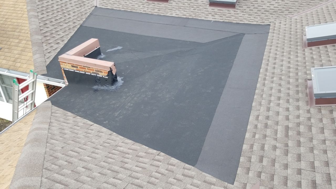Skylight removal and install  by Absolute Roofing and Construction