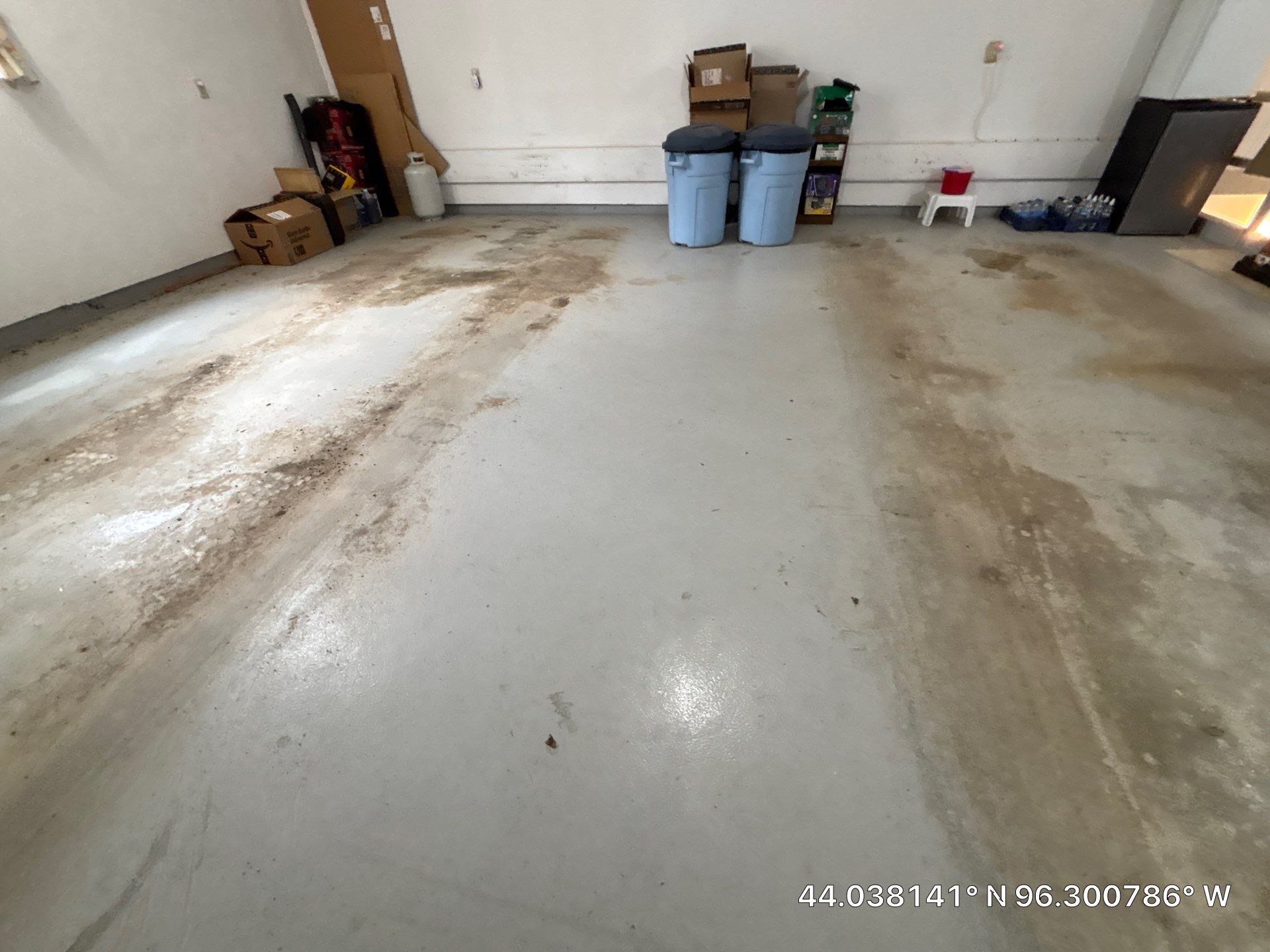 Custom Polyaspartic Garage Floor and Stairwell Coating in Pipestone by Select Painting, Coatings & Garage Cabinets